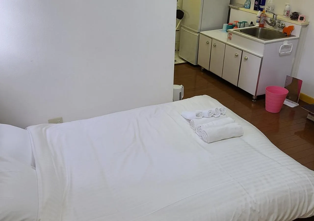 Bed in Bluebird Hotel