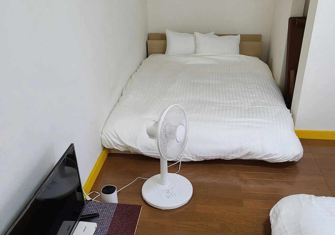 Bed in Bluebird Hotel