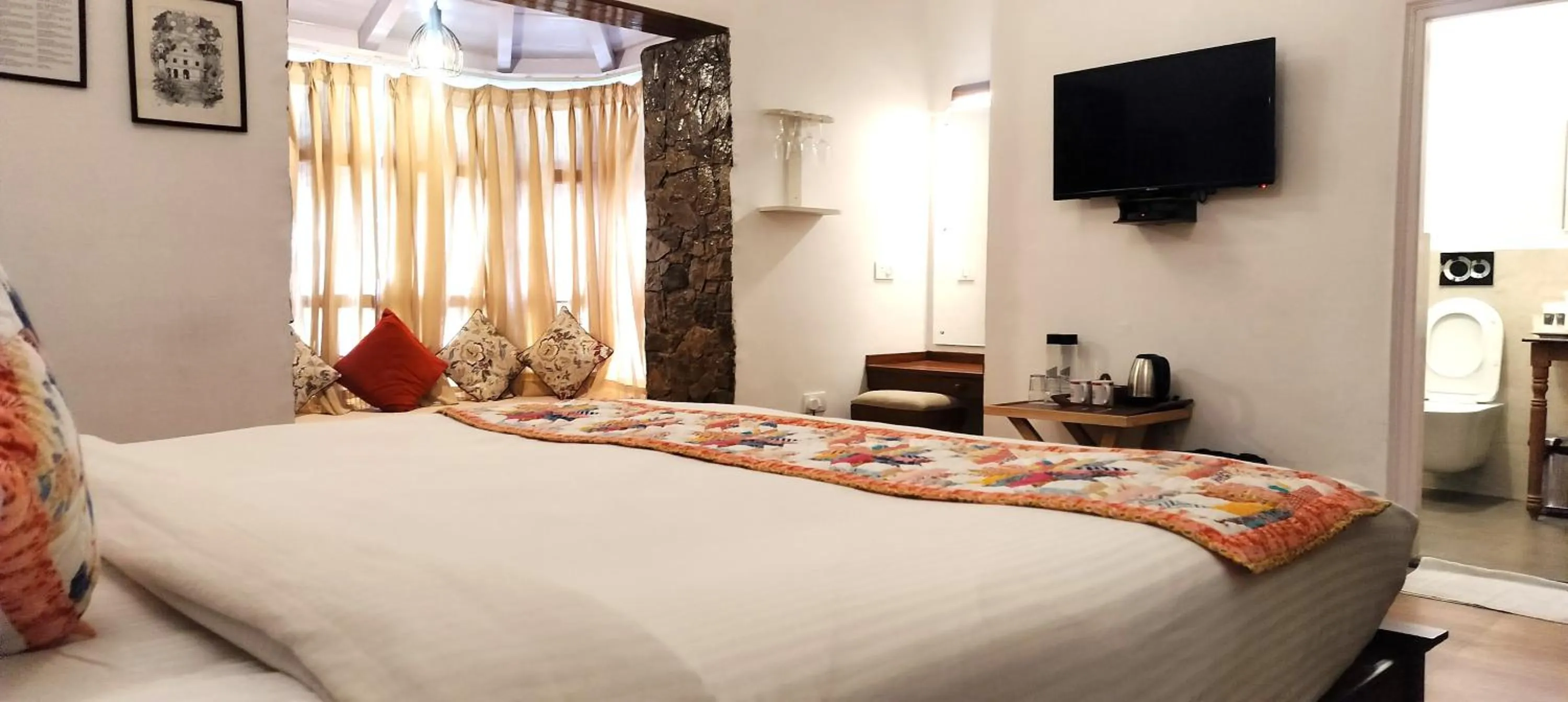 Photo of the whole room in Bhikampur Lodge By Nine Hotels