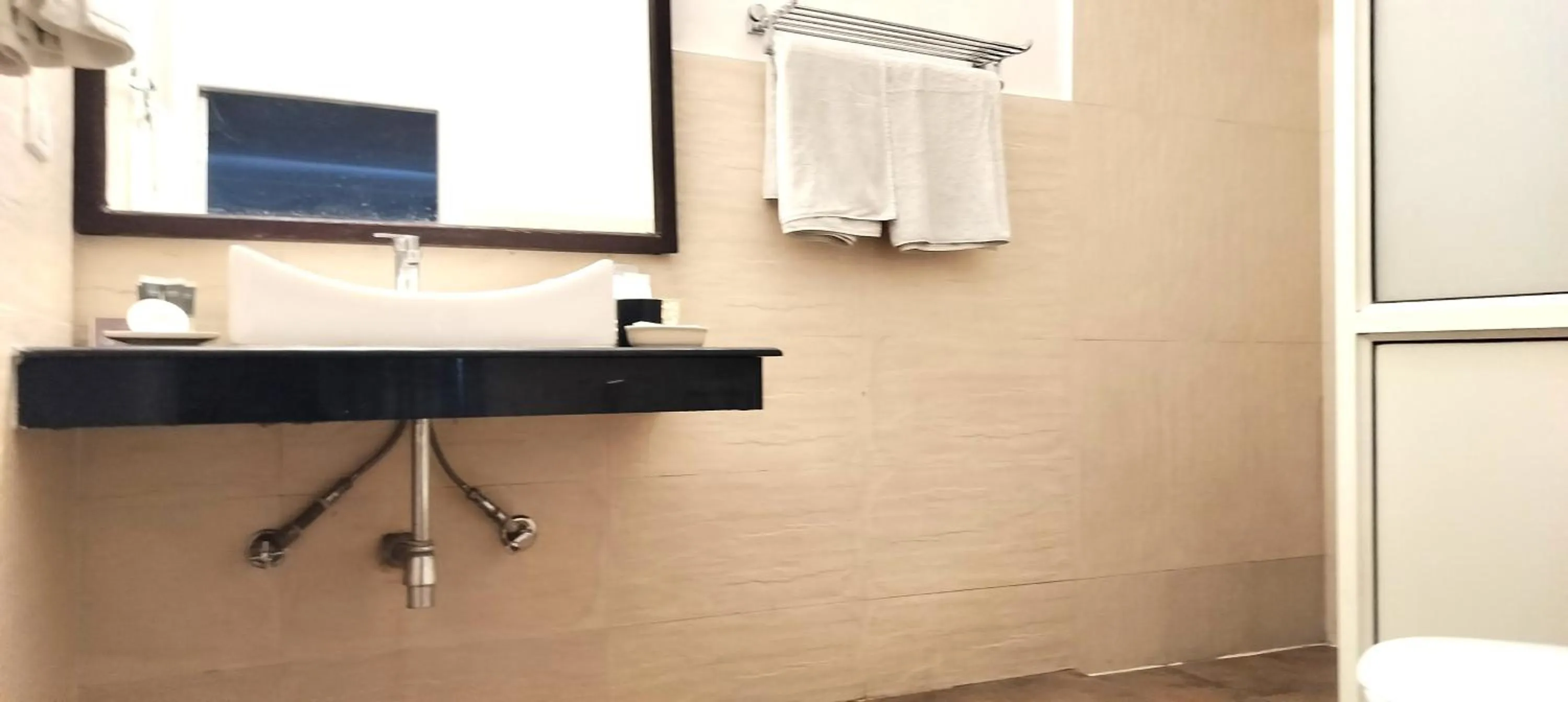 Bathroom in Bhikampur Lodge By Nine Hotels