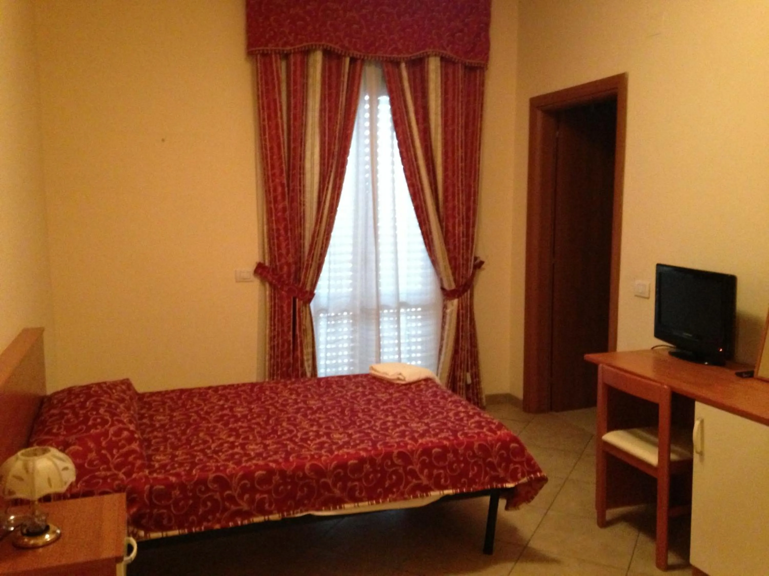 Bedroom, Bed in Affittacamere Flavia Roma