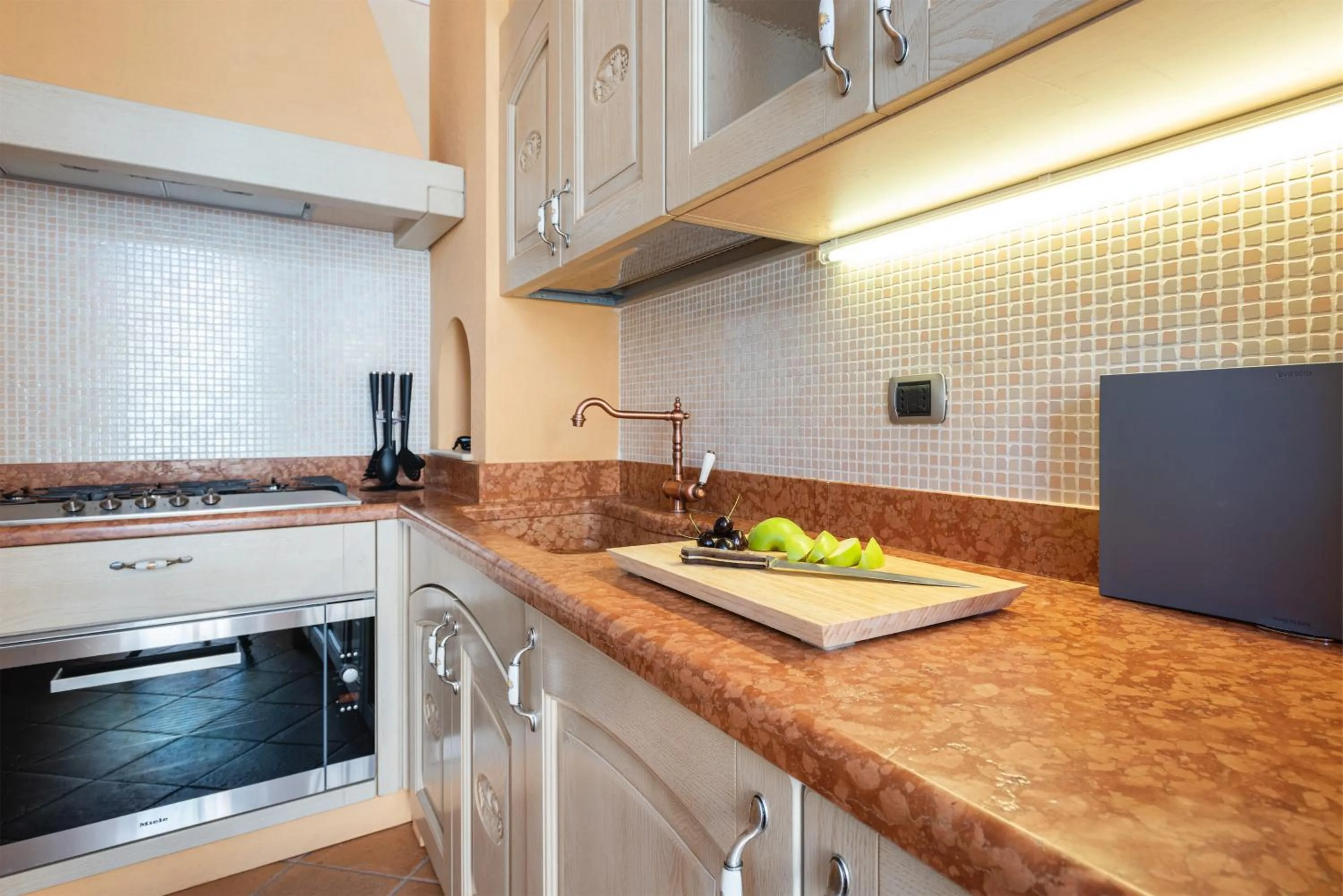 Kitchen or kitchenette in Attico la Rocca
