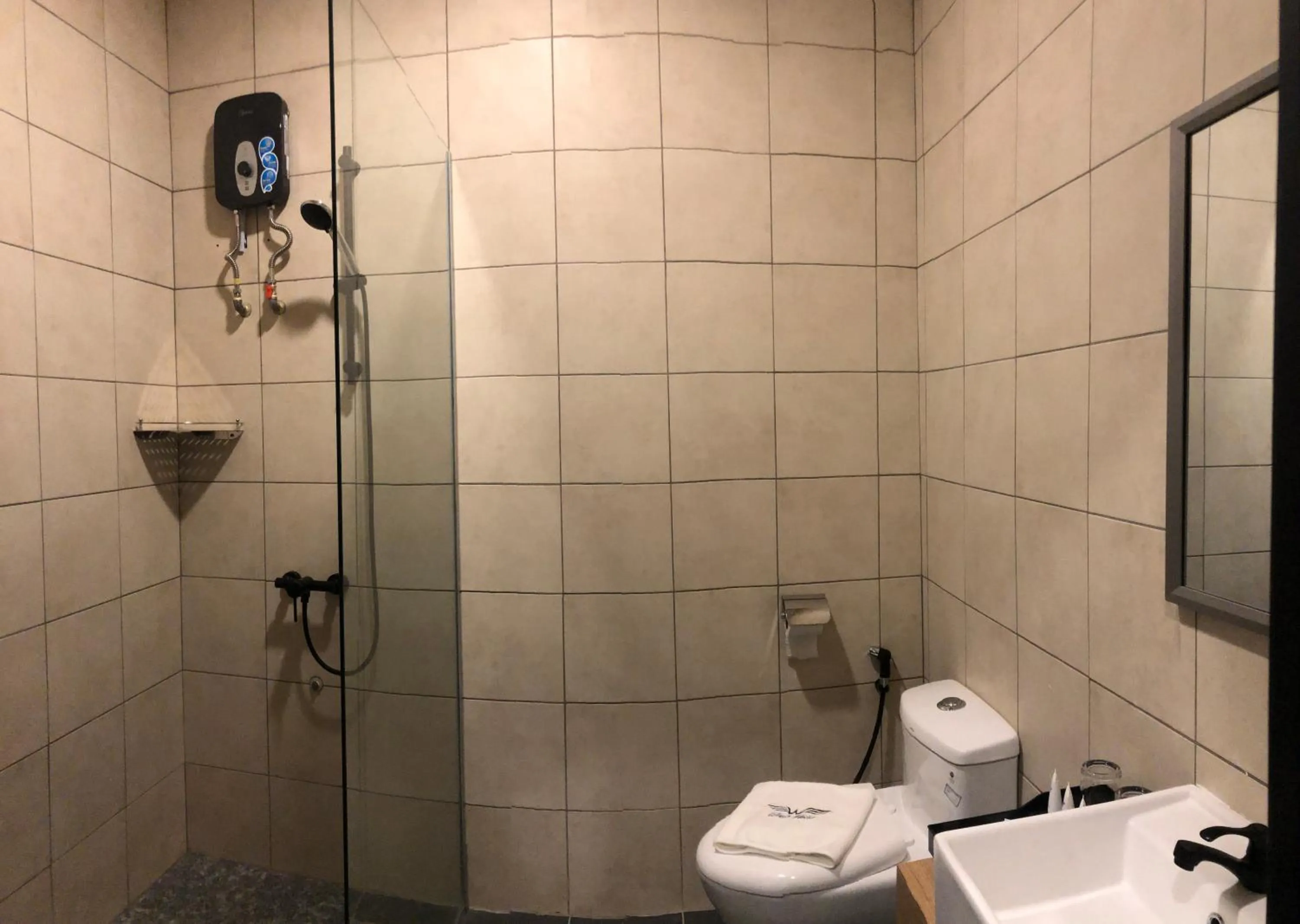 Bathroom in Wings Hotel