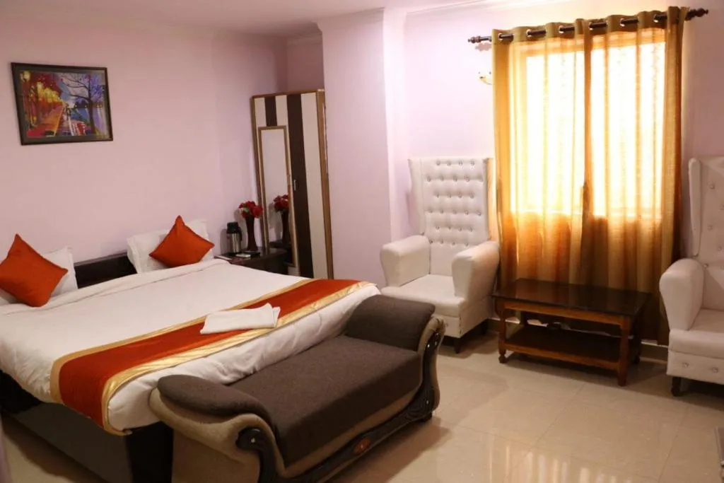 Bed in Hotel Sarweshwary