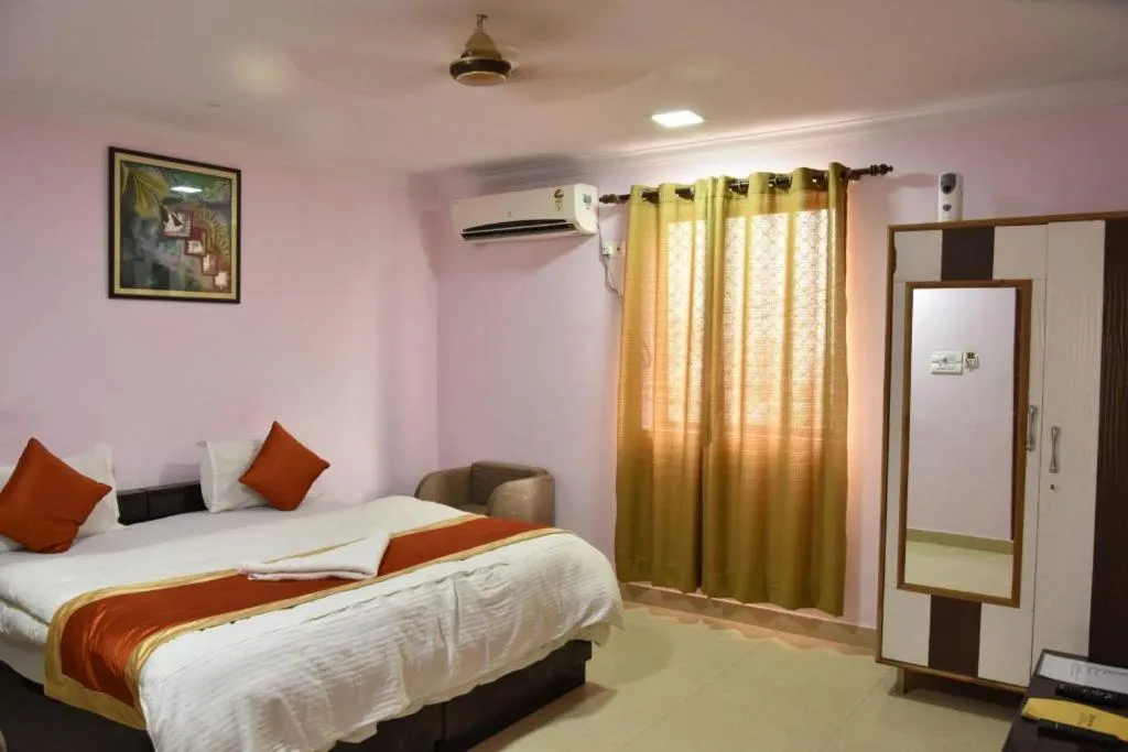 Bed in Hotel Sarweshwary