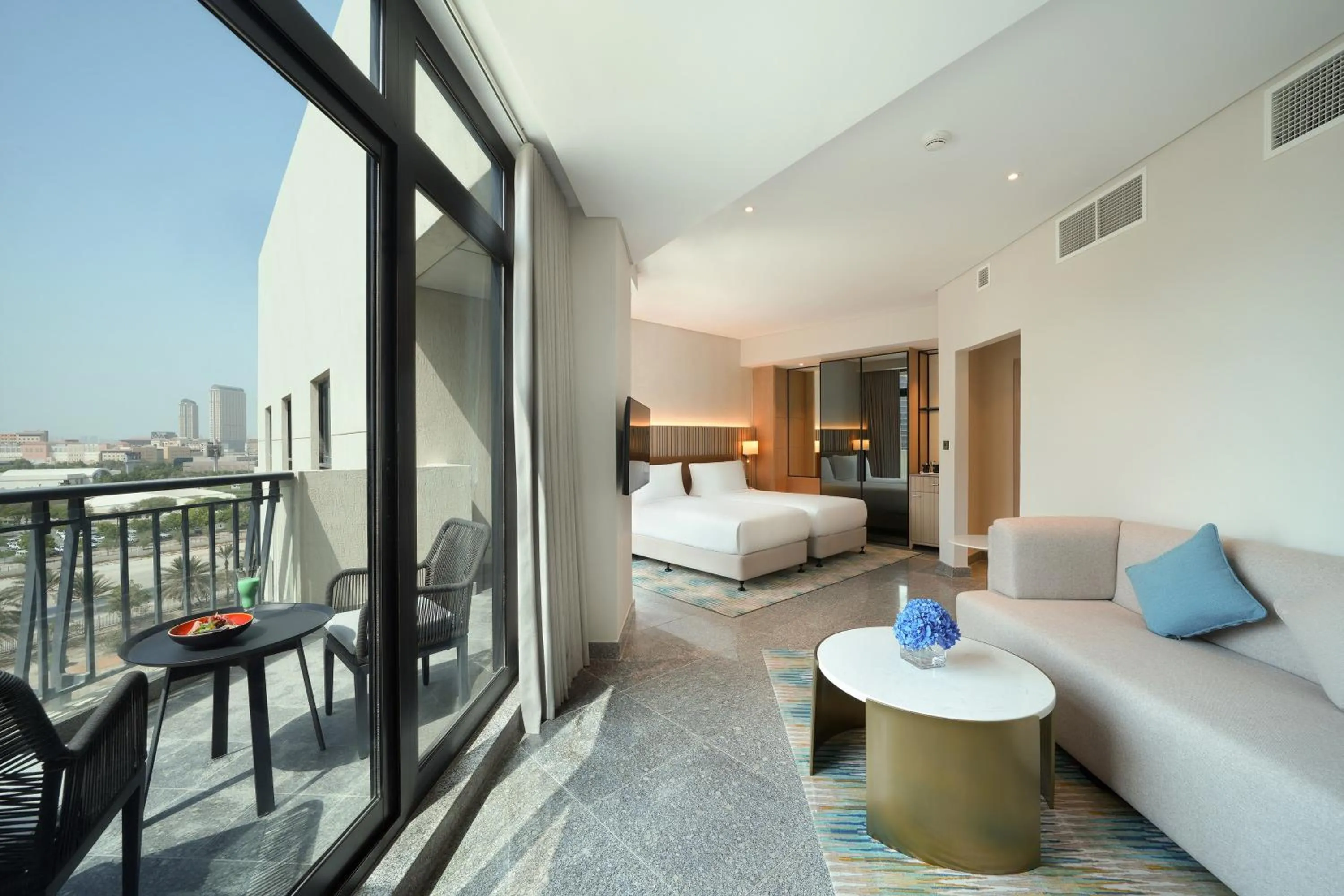 Balcony/Terrace, Bed in Arabian Park Dubai, an Edge by Rotana Hotel