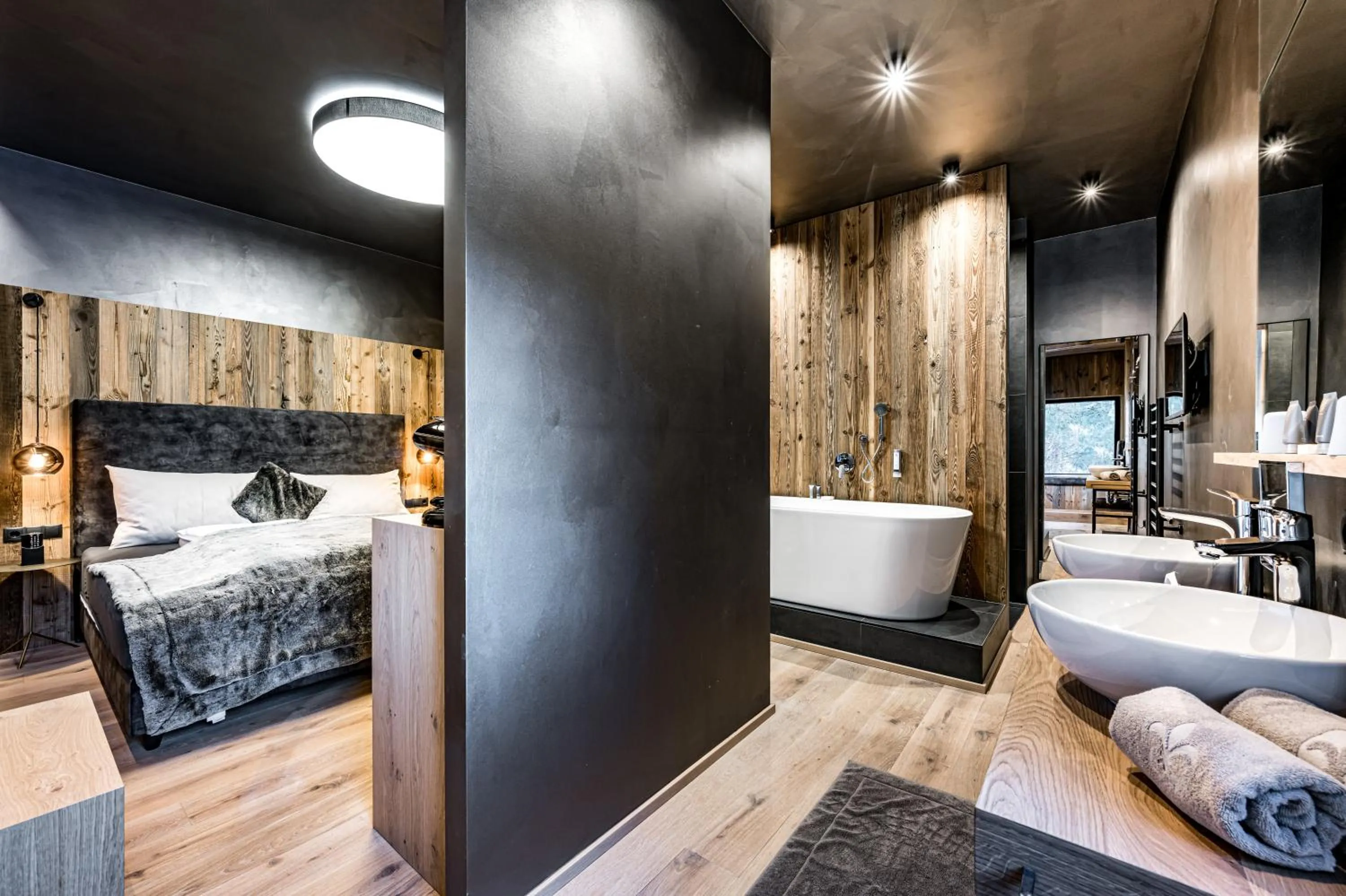 Bed in ALMMONTE PRÄCLARUM SUITES - Casual Boutique Hotel