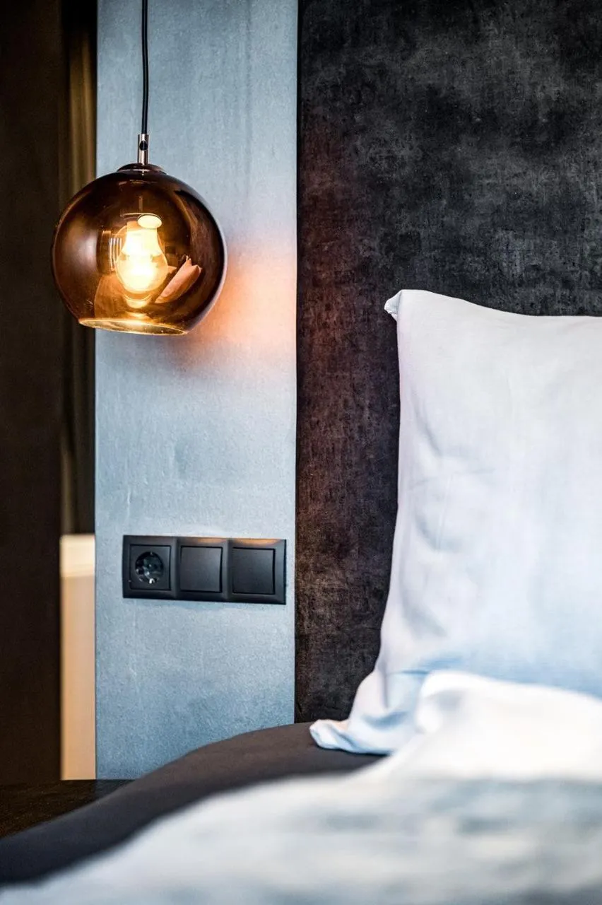 Bed in ALMMONTE PRÄCLARUM SUITES - Casual Boutique Hotel