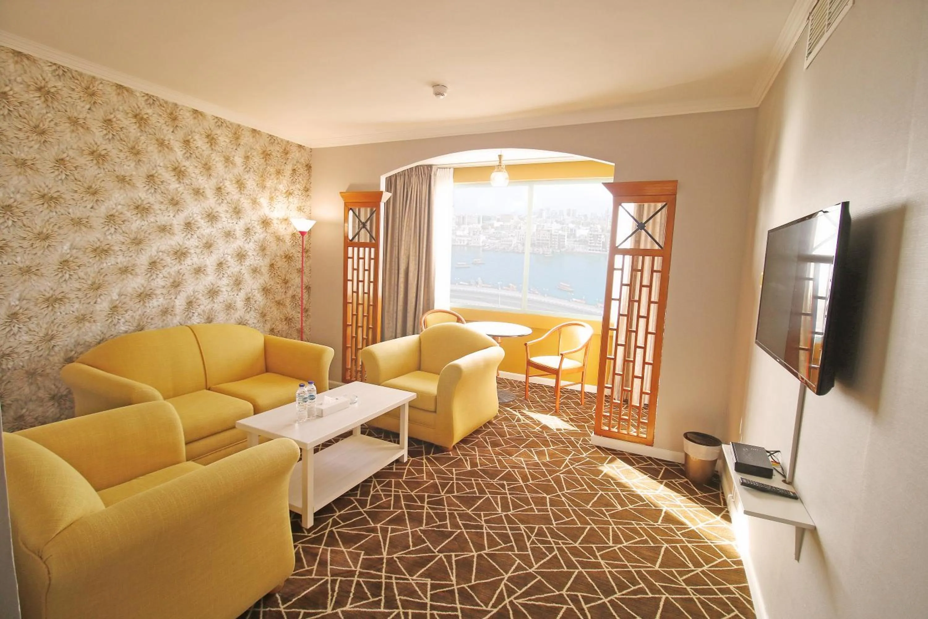 Living room in The George Hotel by Saffron, Dubai Creek