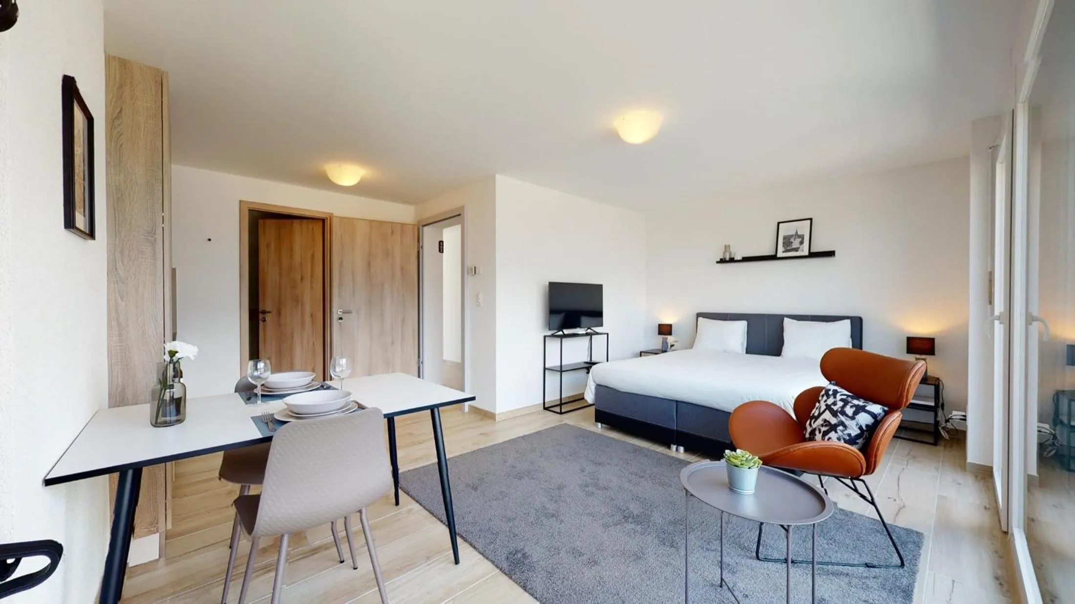 Bedroom, Bed in Nonanteneuf appart hōtel Aigle - contactless check-in