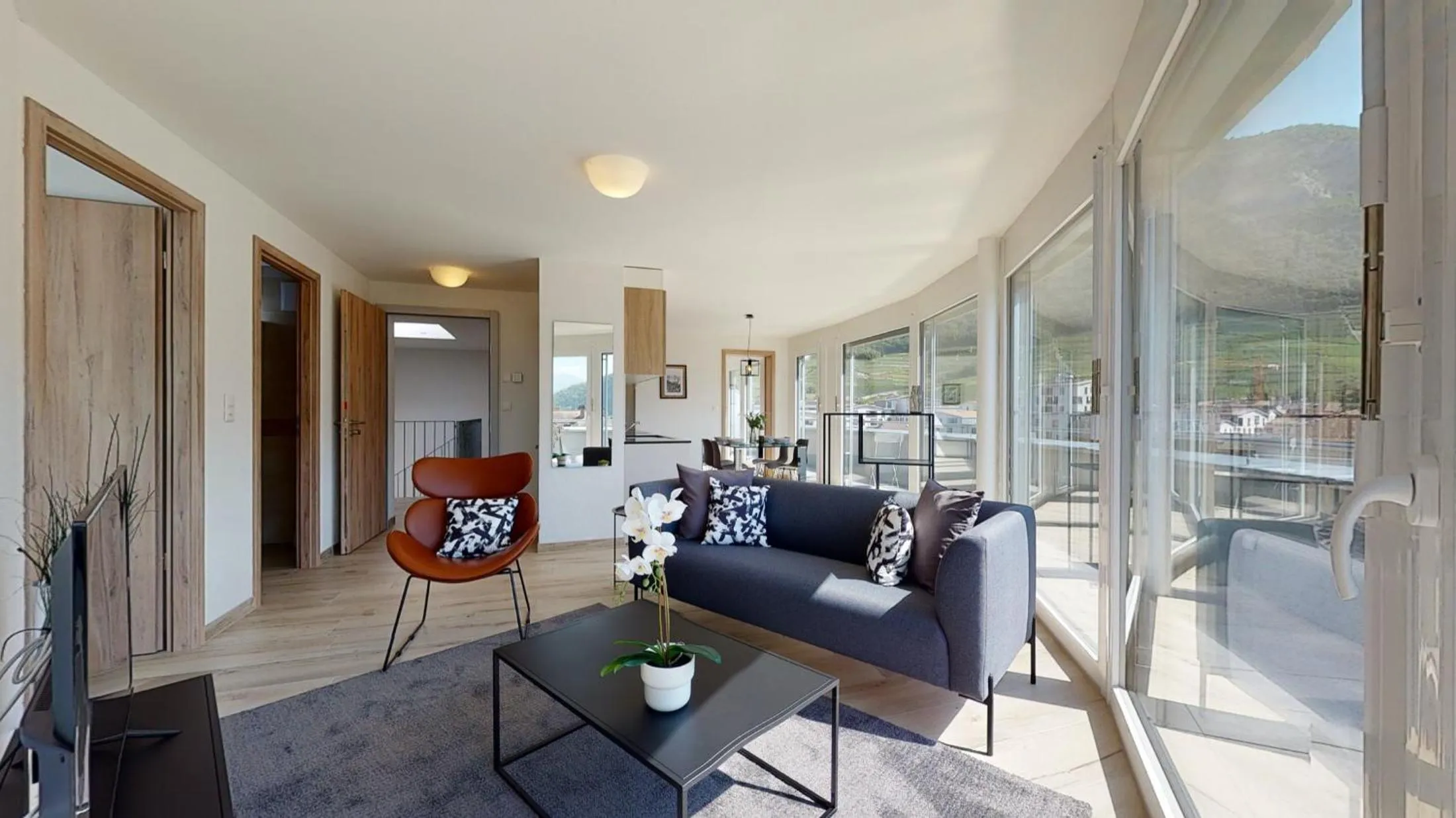 Living room in Nonanteneuf appart hōtel Aigle - contactless check-in