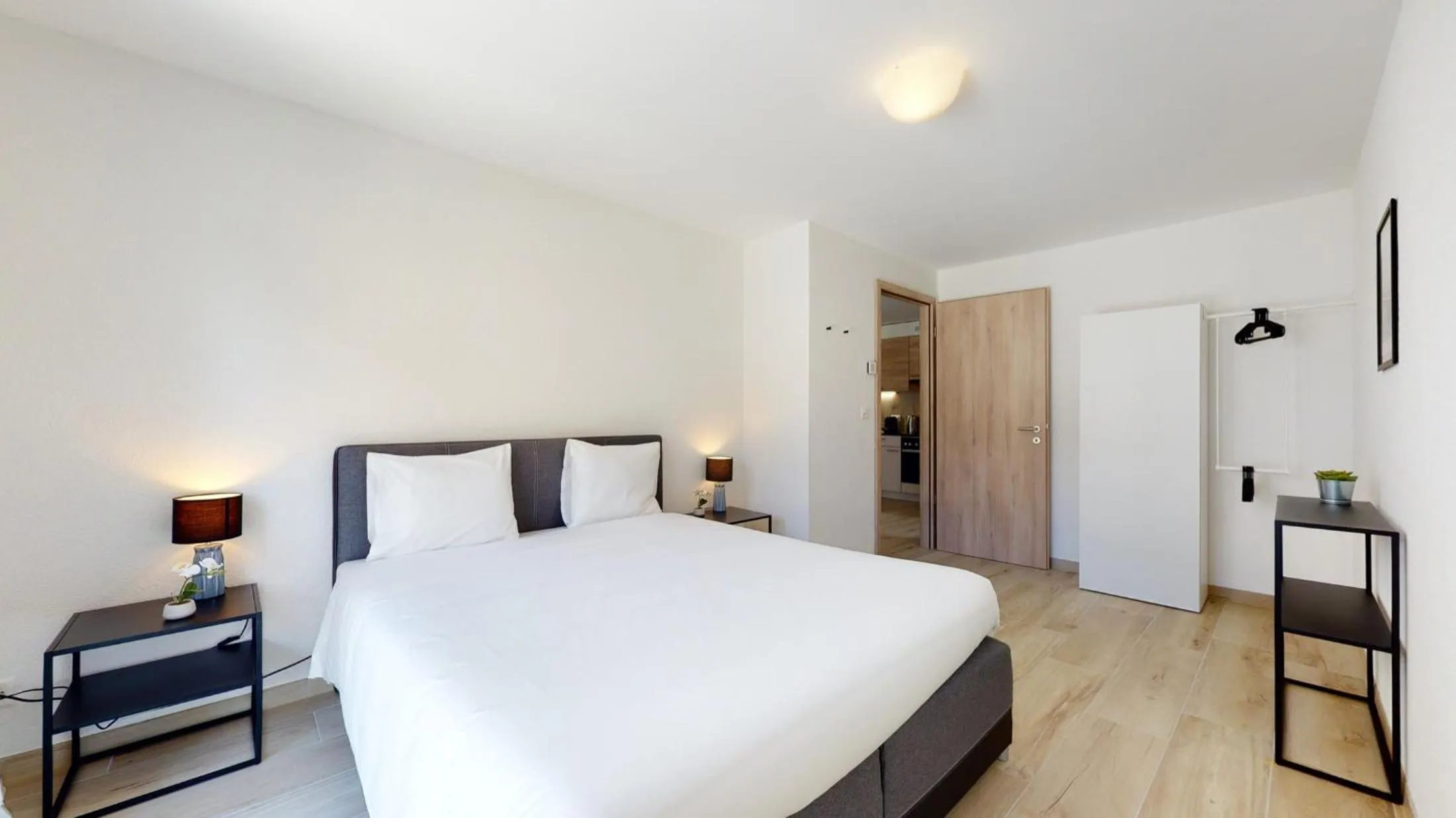 Bedroom, Bed in Nonanteneuf appart hōtel Aigle - contactless check-in