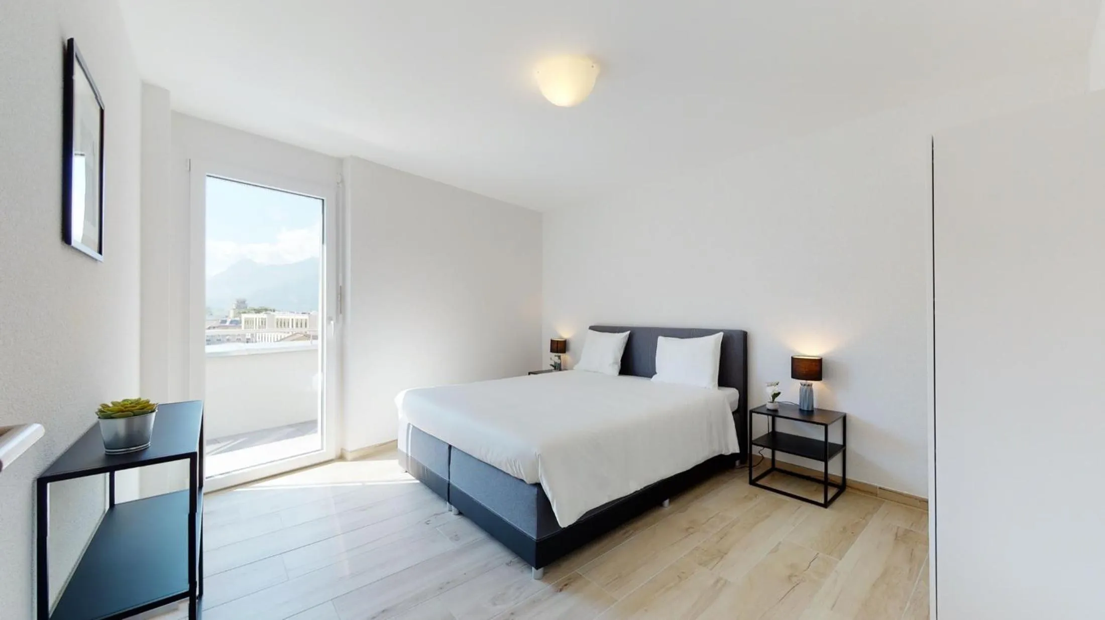 Bedroom, Bed in Nonanteneuf appart hōtel Aigle - contactless check-in