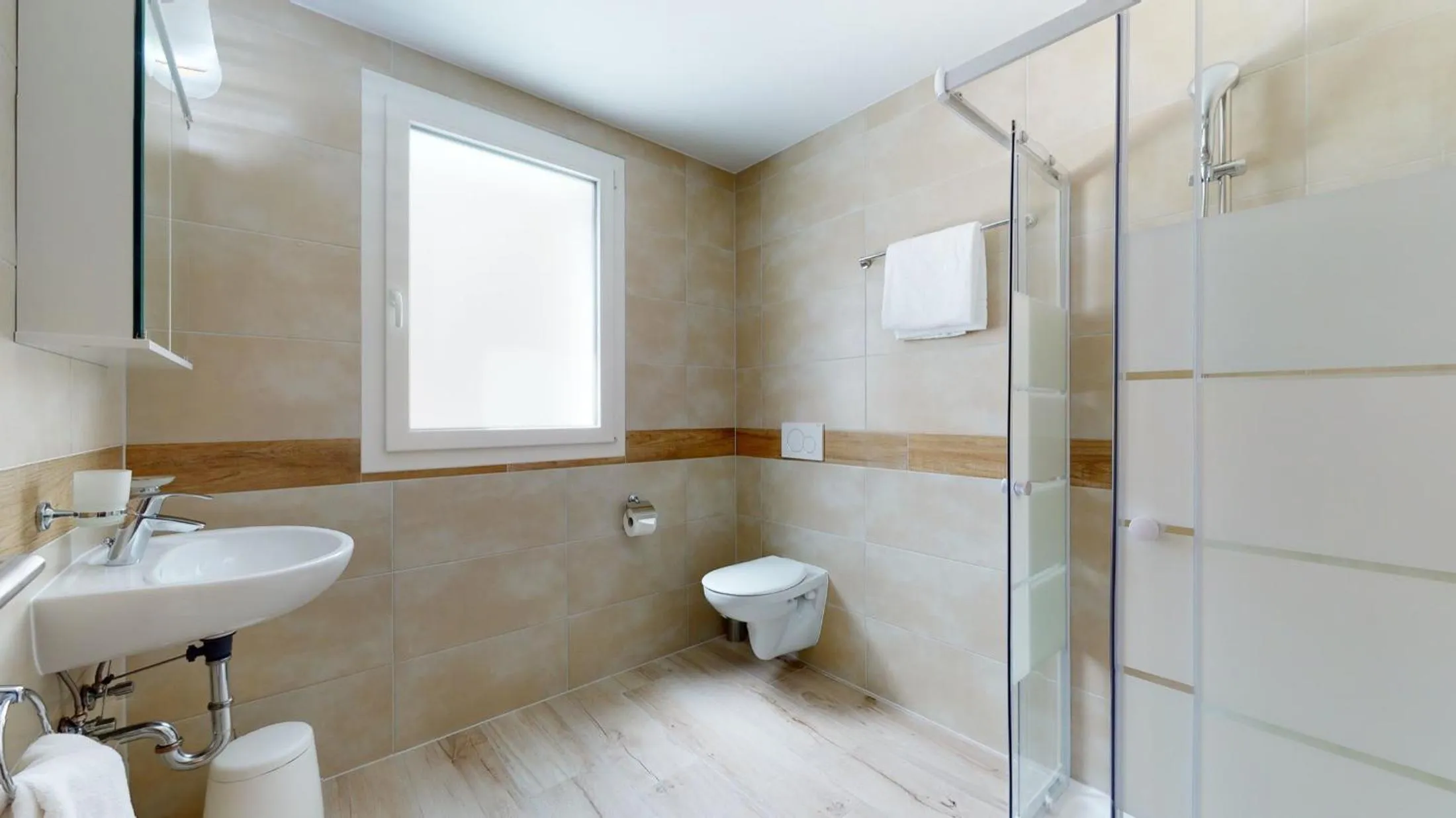 Bathroom in Nonanteneuf appart hōtel Aigle - contactless check-in