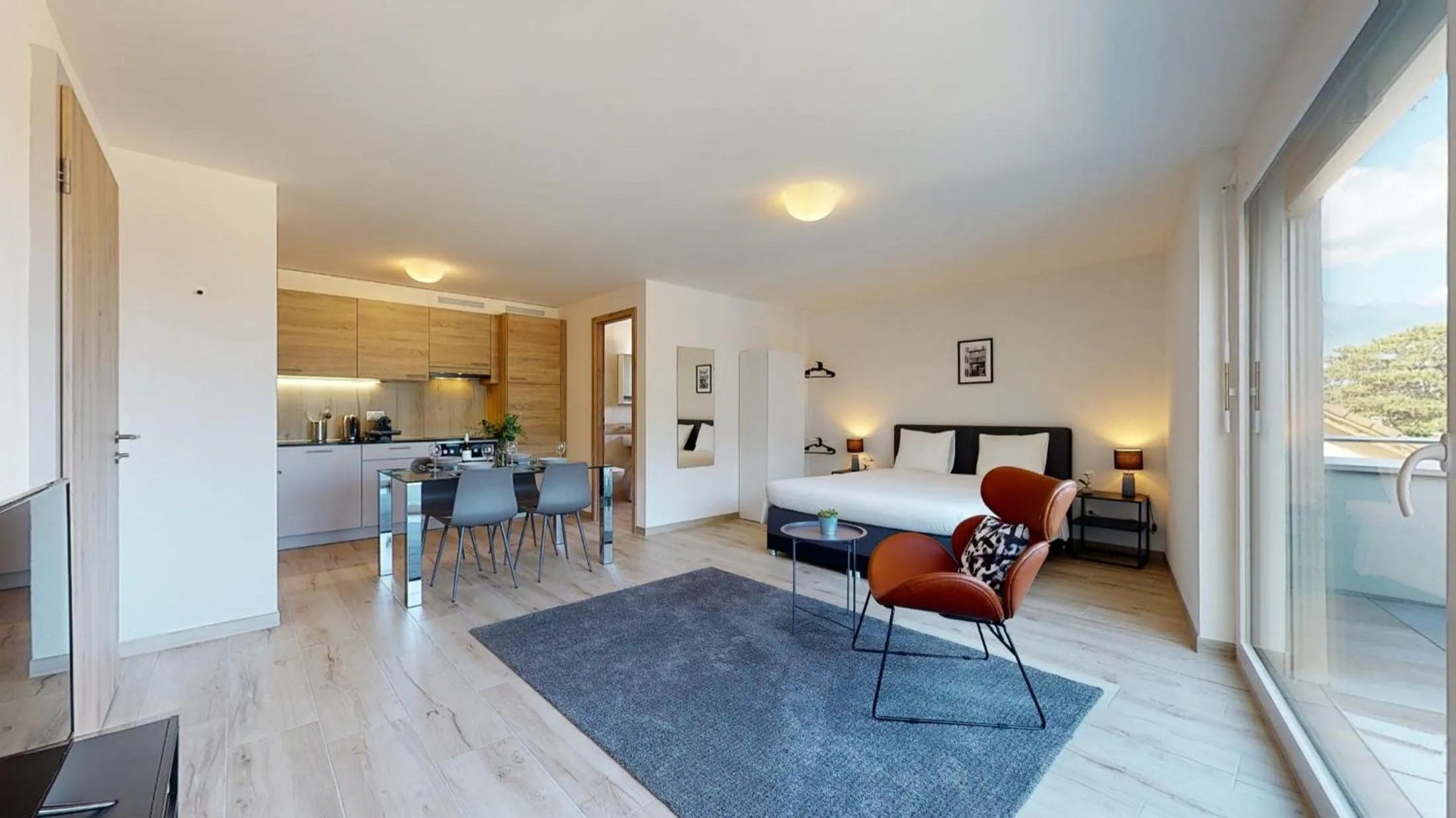 Bedroom in Nonanteneuf appart hōtel Aigle - contactless check-in