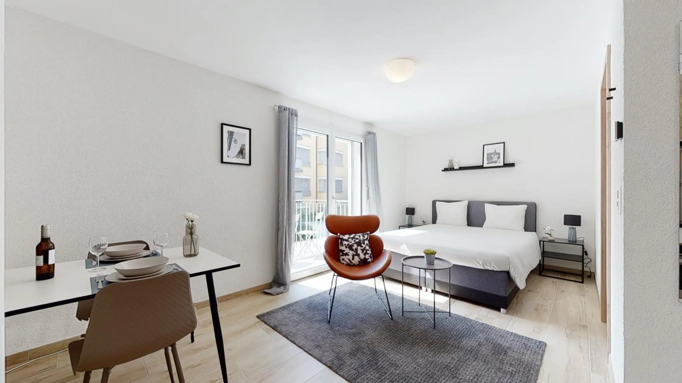 Bedroom in Nonanteneuf appart hōtel Aigle - contactless check-in