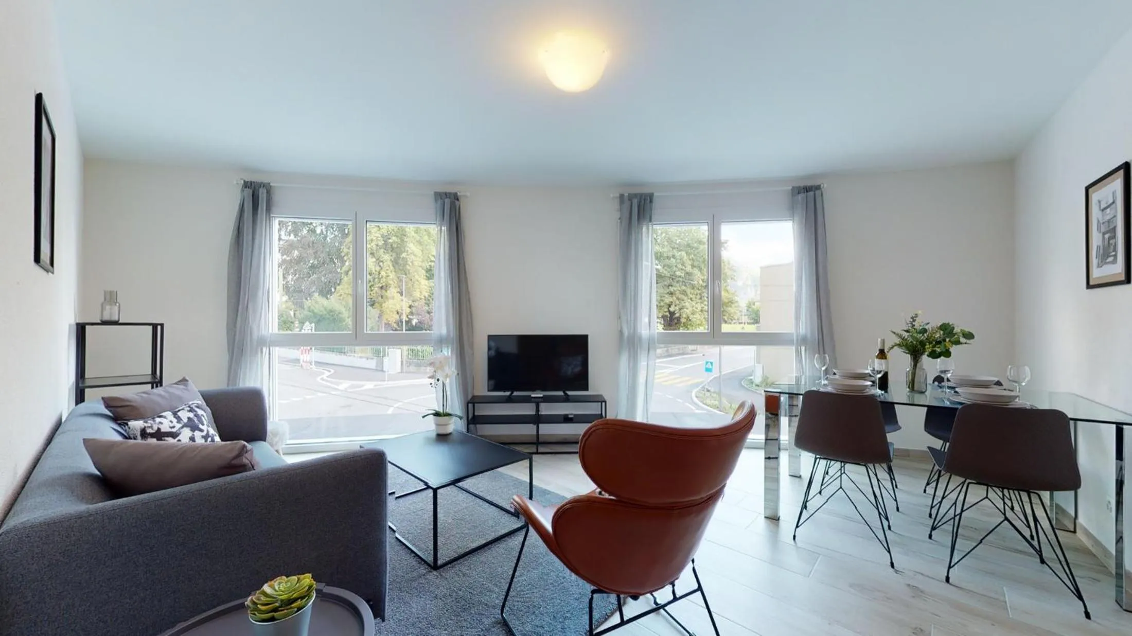 Living room in Nonanteneuf appart hōtel Aigle - contactless check-in