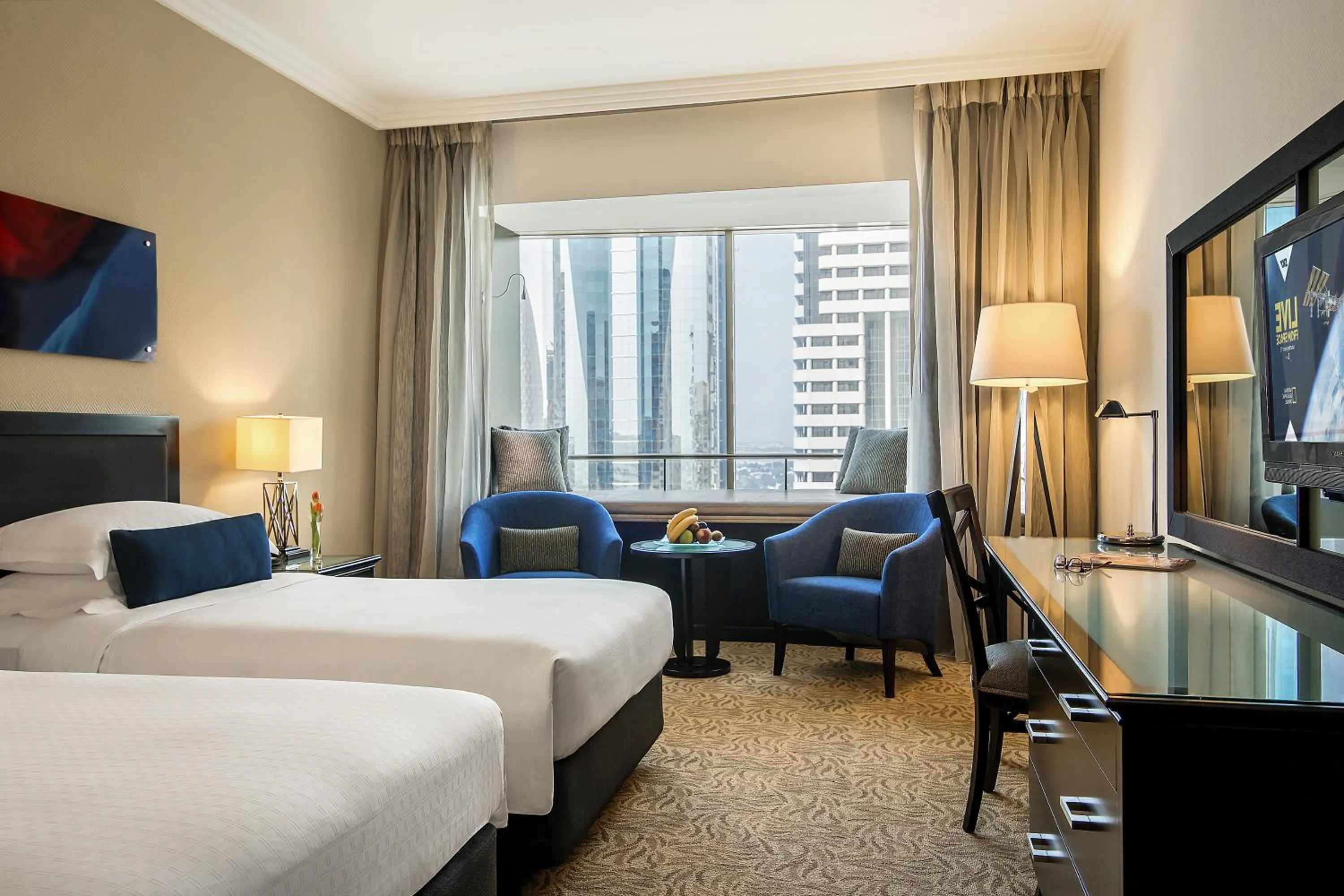 Photo of the whole room, Bed in Towers Rotana - Dubai