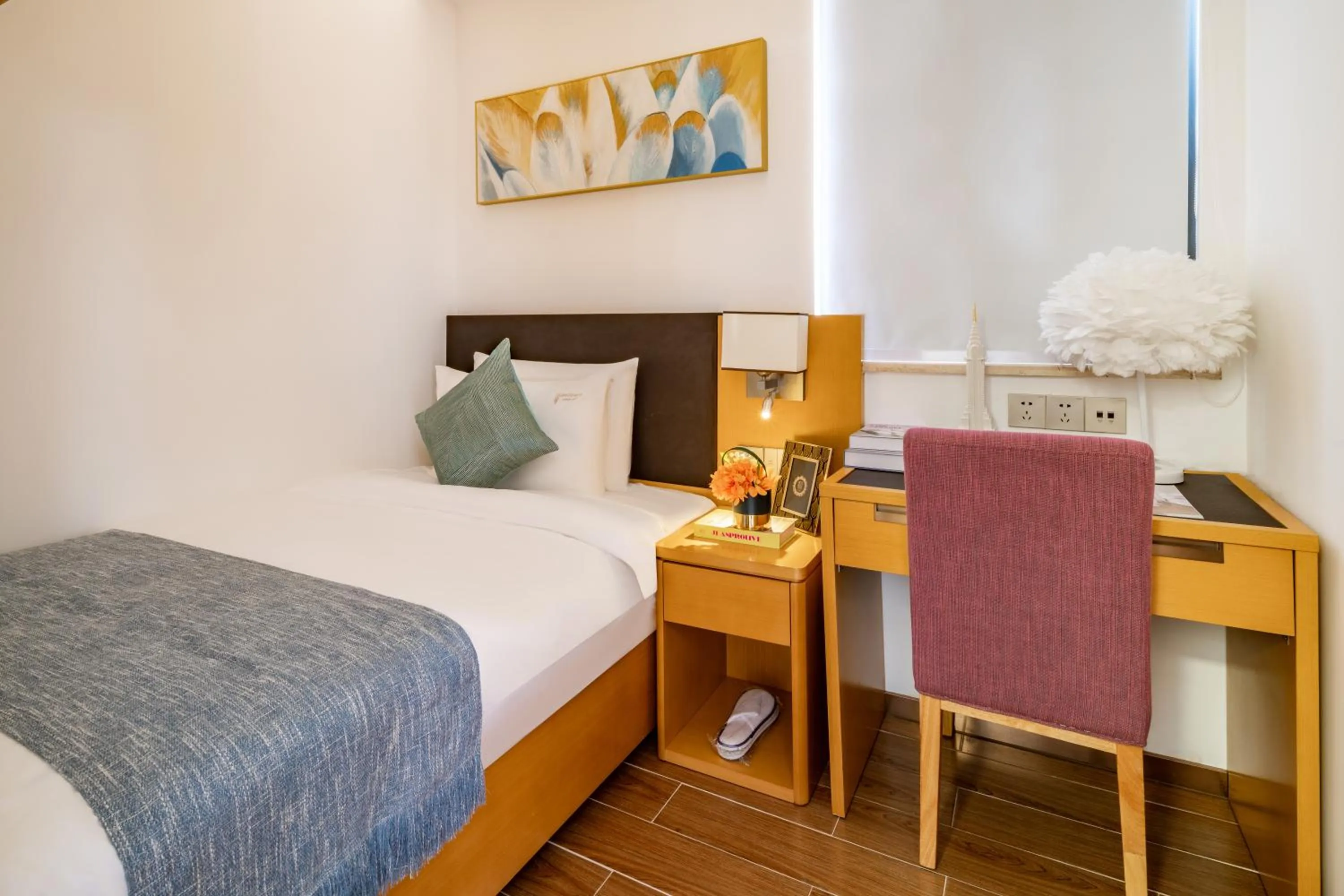 Bed in Dingshang Apartment Hotel