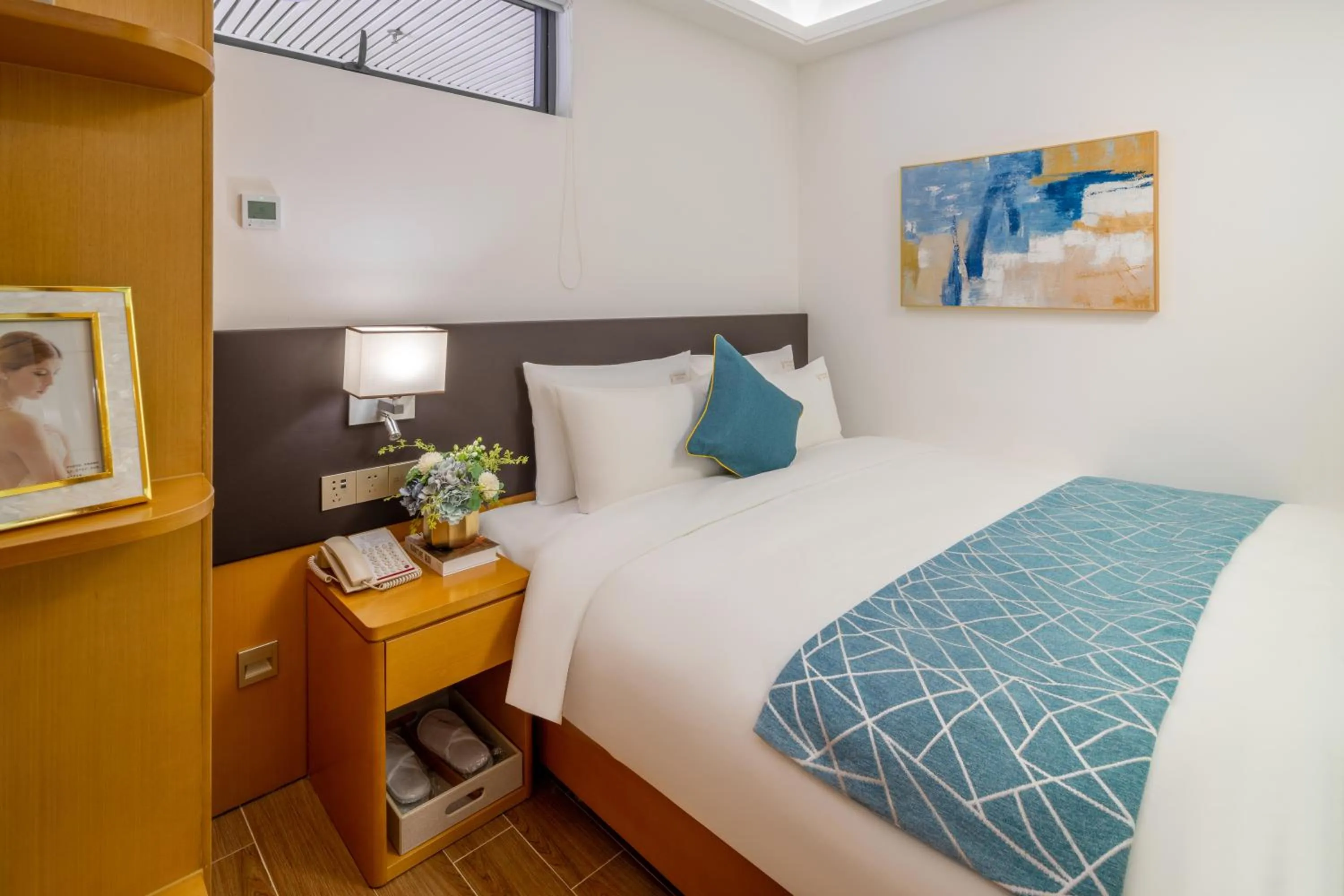 Bed in Dingshang Apartment Hotel