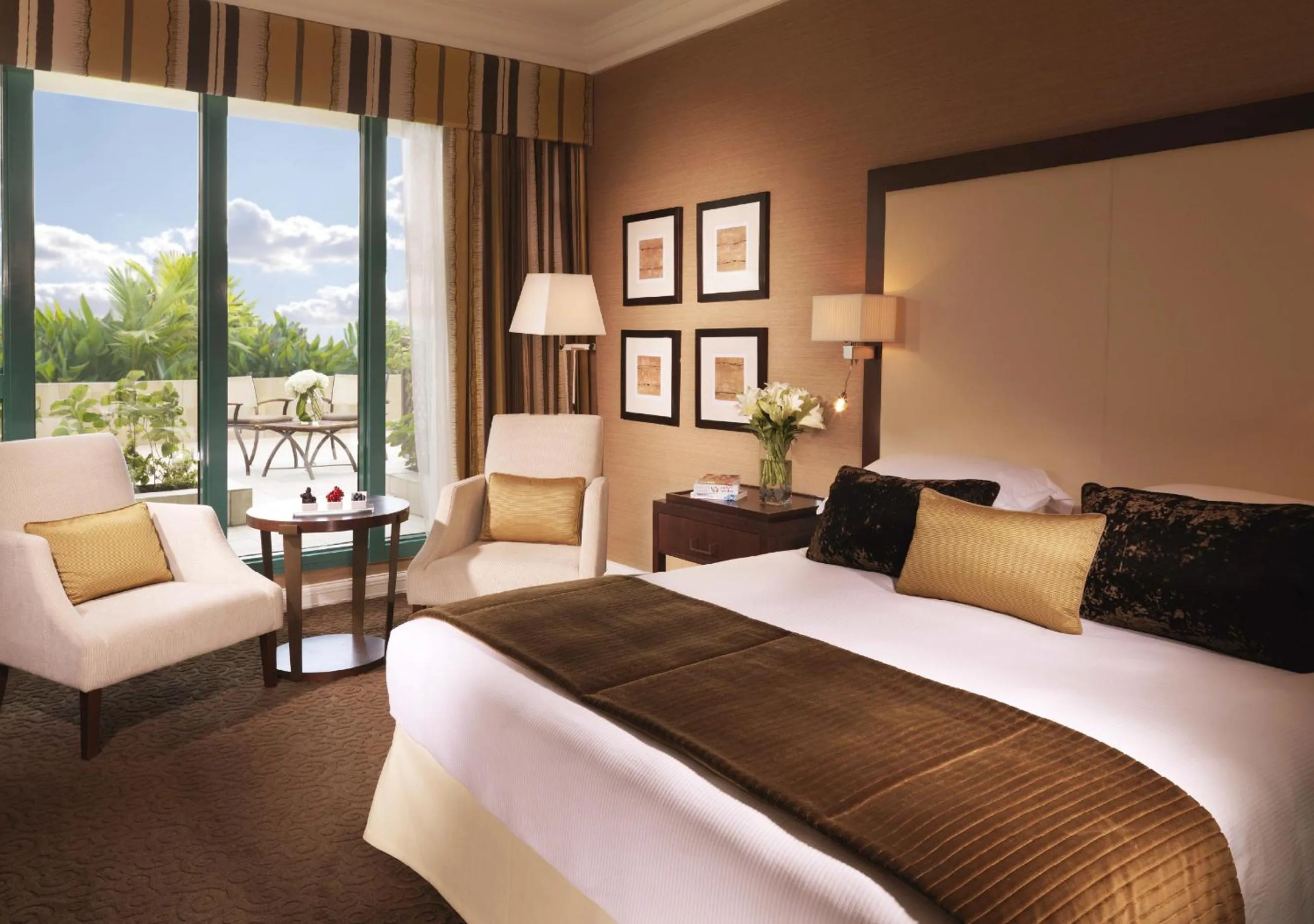 Bed in Mövenpick Grand Al Bustan