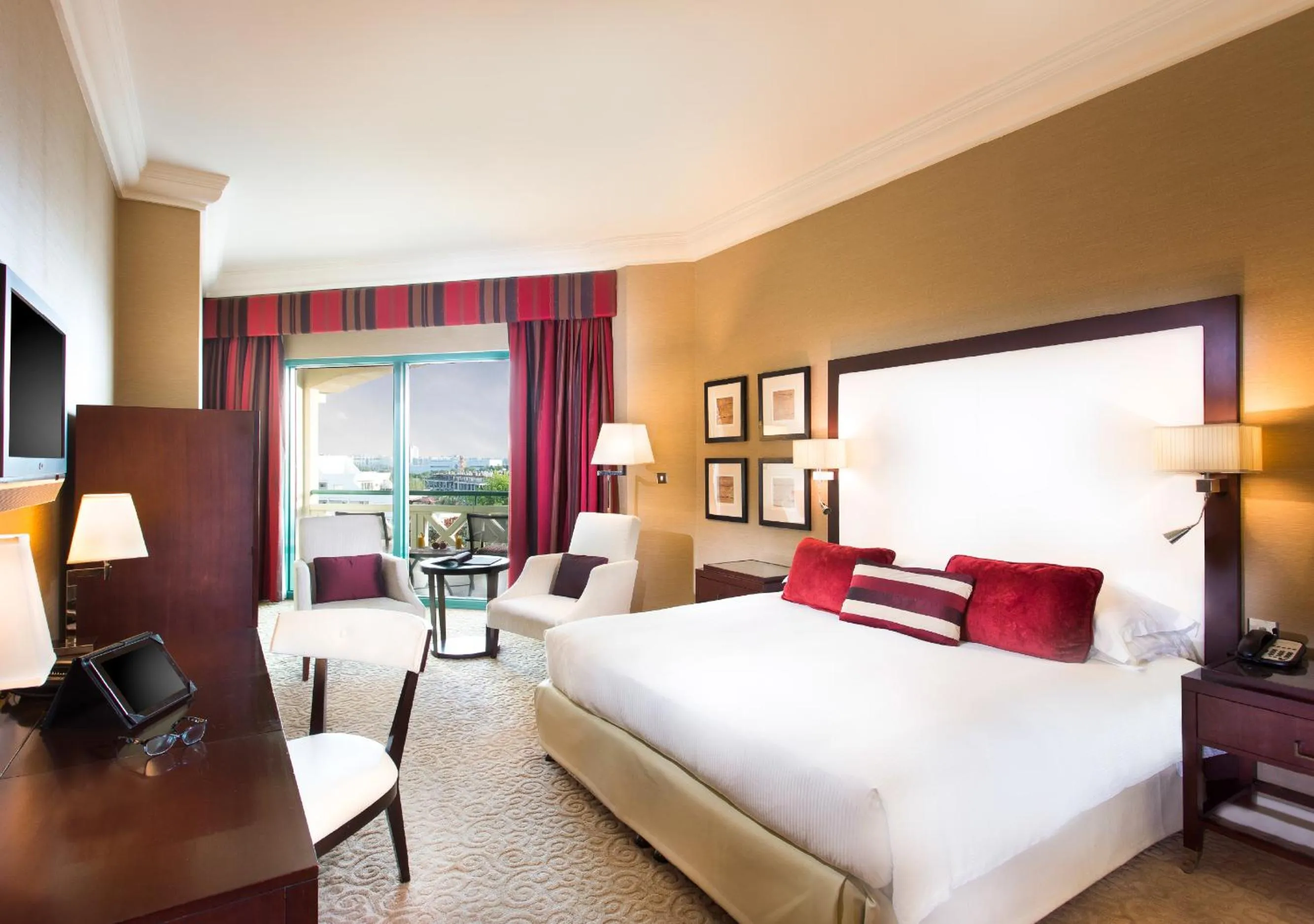 Bed in Mövenpick Grand Al Bustan