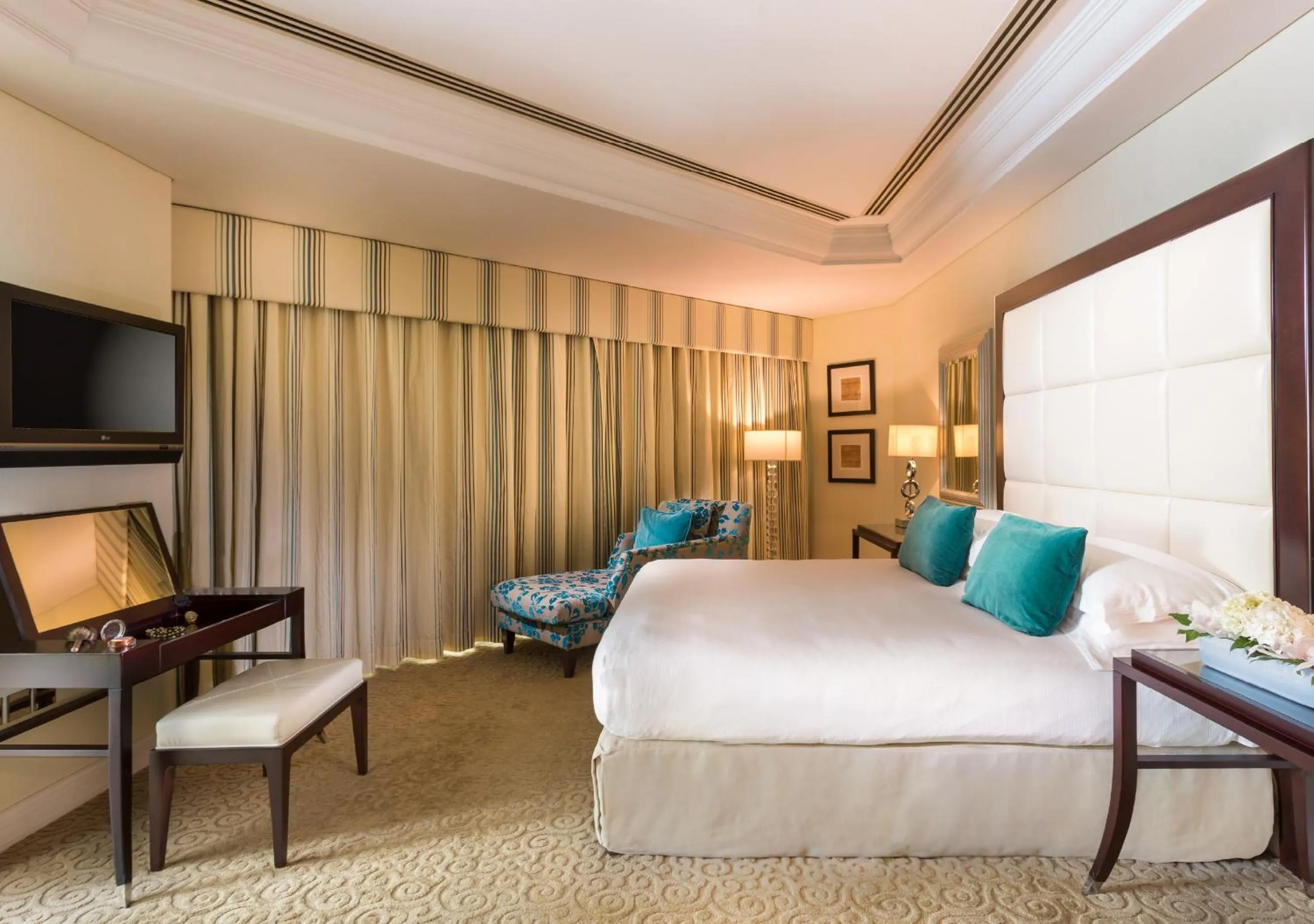 Bed in Mövenpick Grand Al Bustan