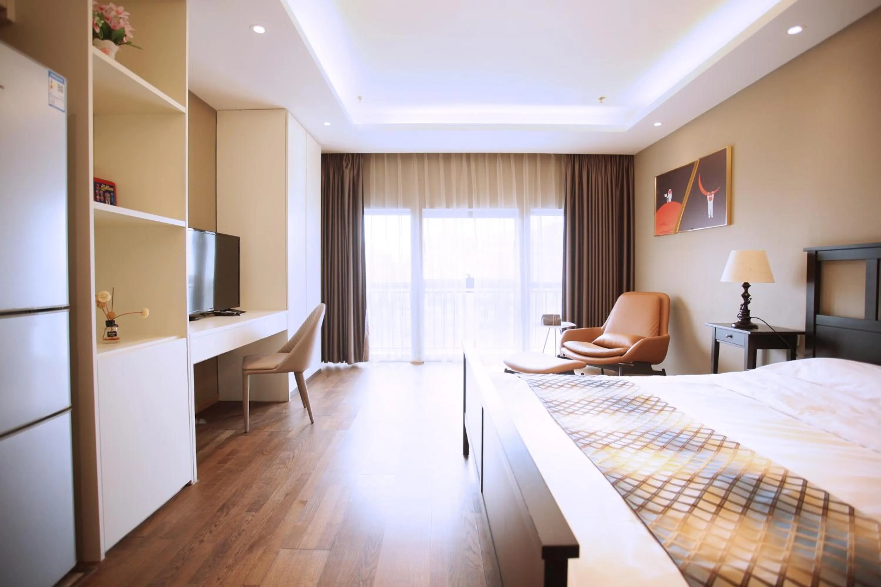 Bed in Yashi International Aparthotel