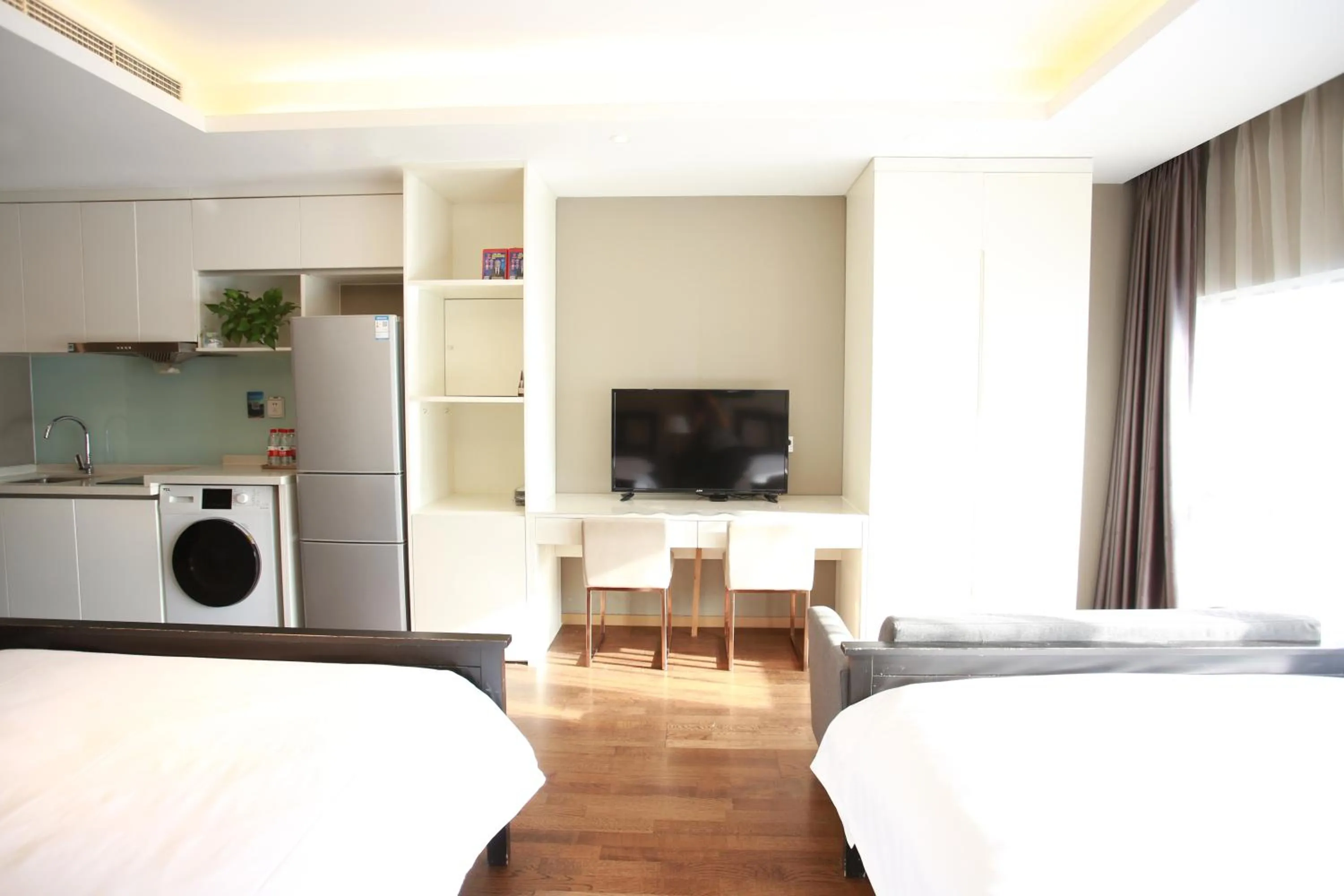 Bed in Yashi International Aparthotel