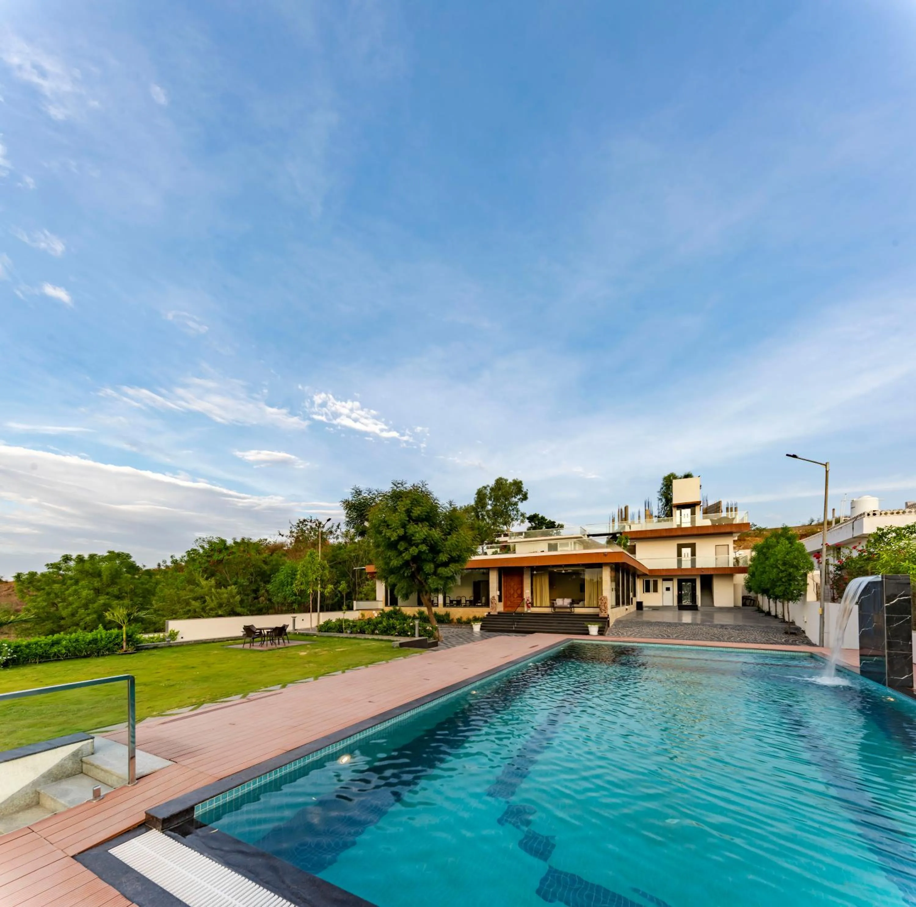 Swimming pool in ama Stays & Trails Talia Costa, Udaipur