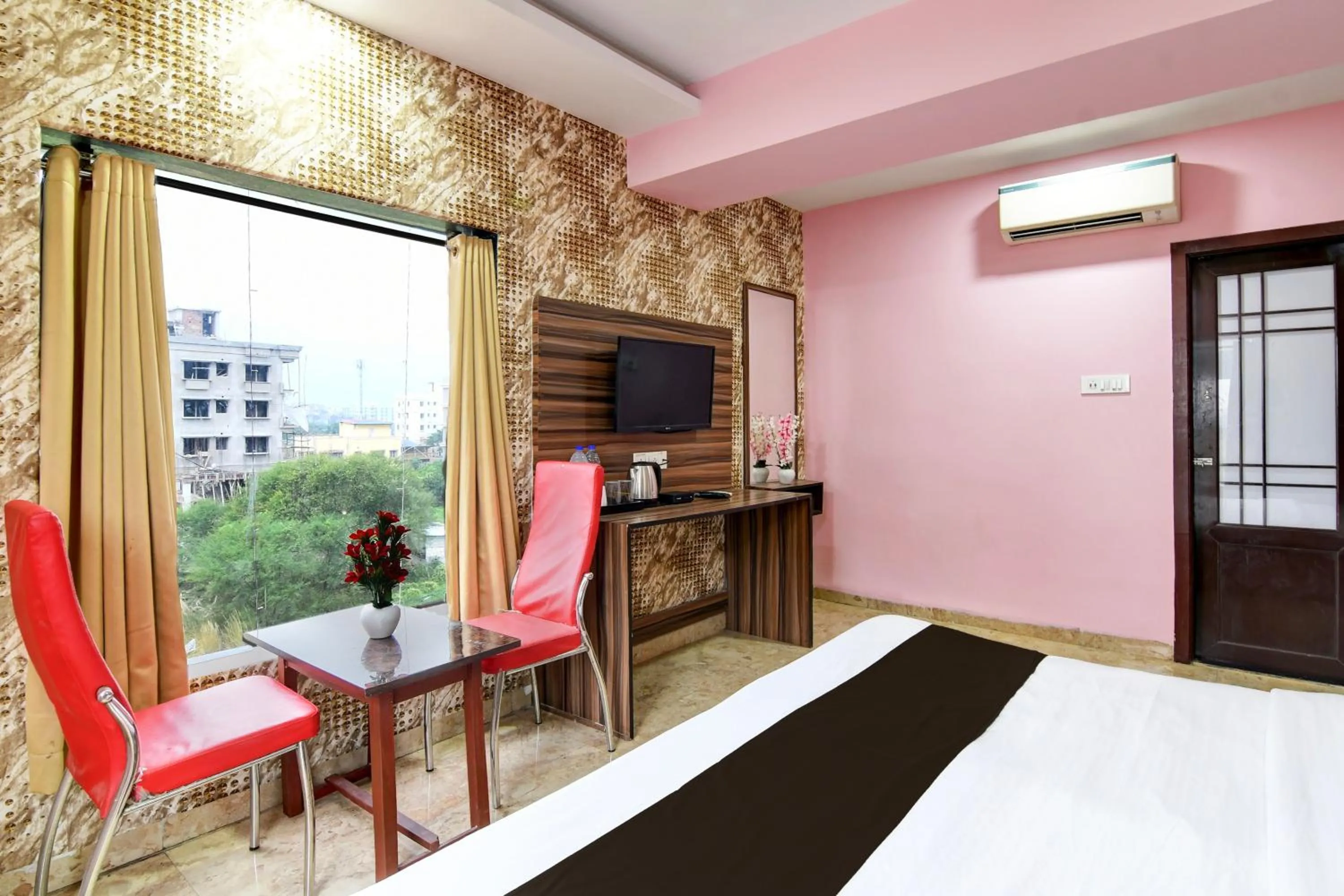 Bedroom in Hotel O Sunshine Near Netaji Subhash Chandra Bose International Airport