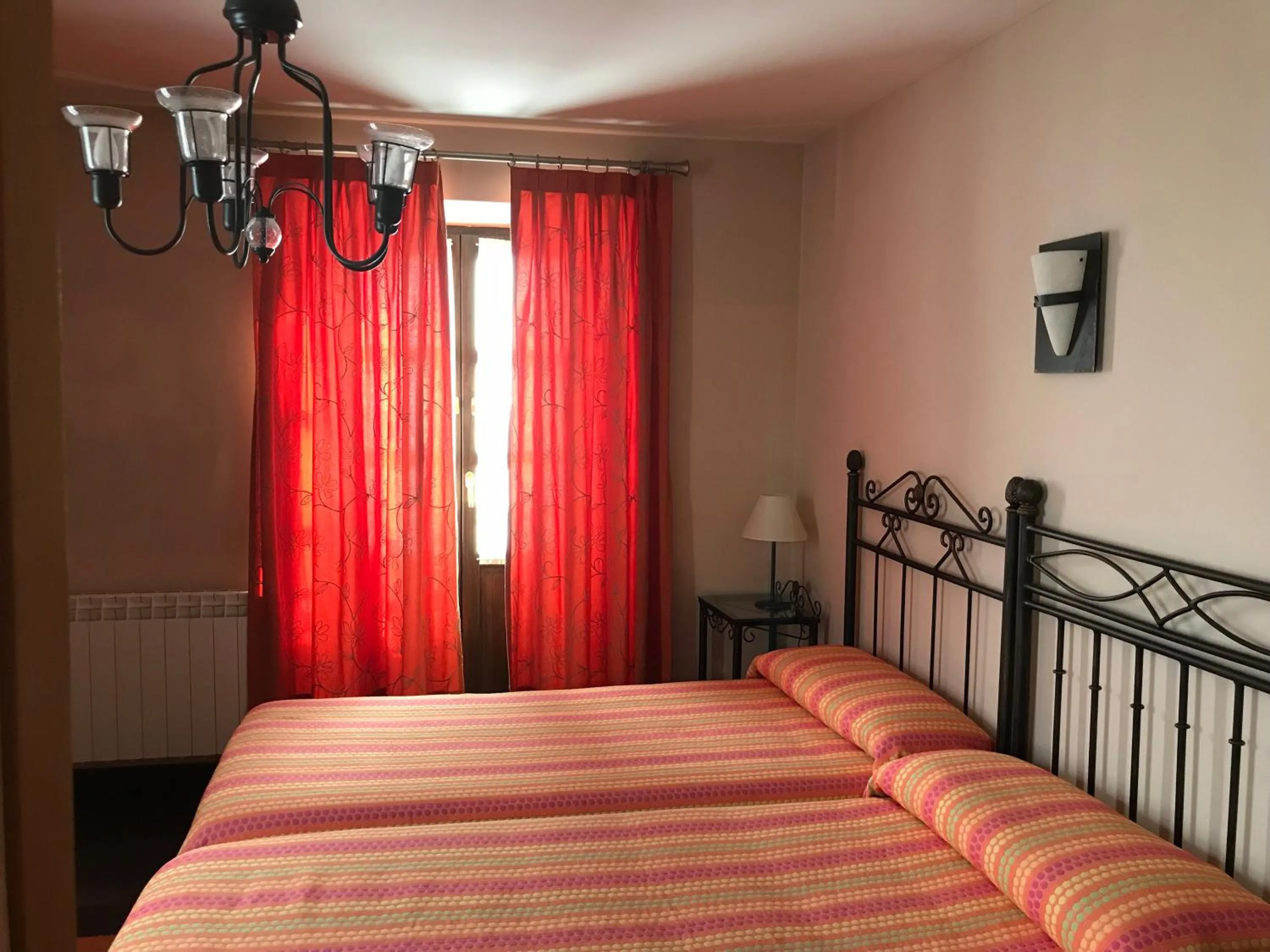 Bed in Apartamentos Ebro Reinosa