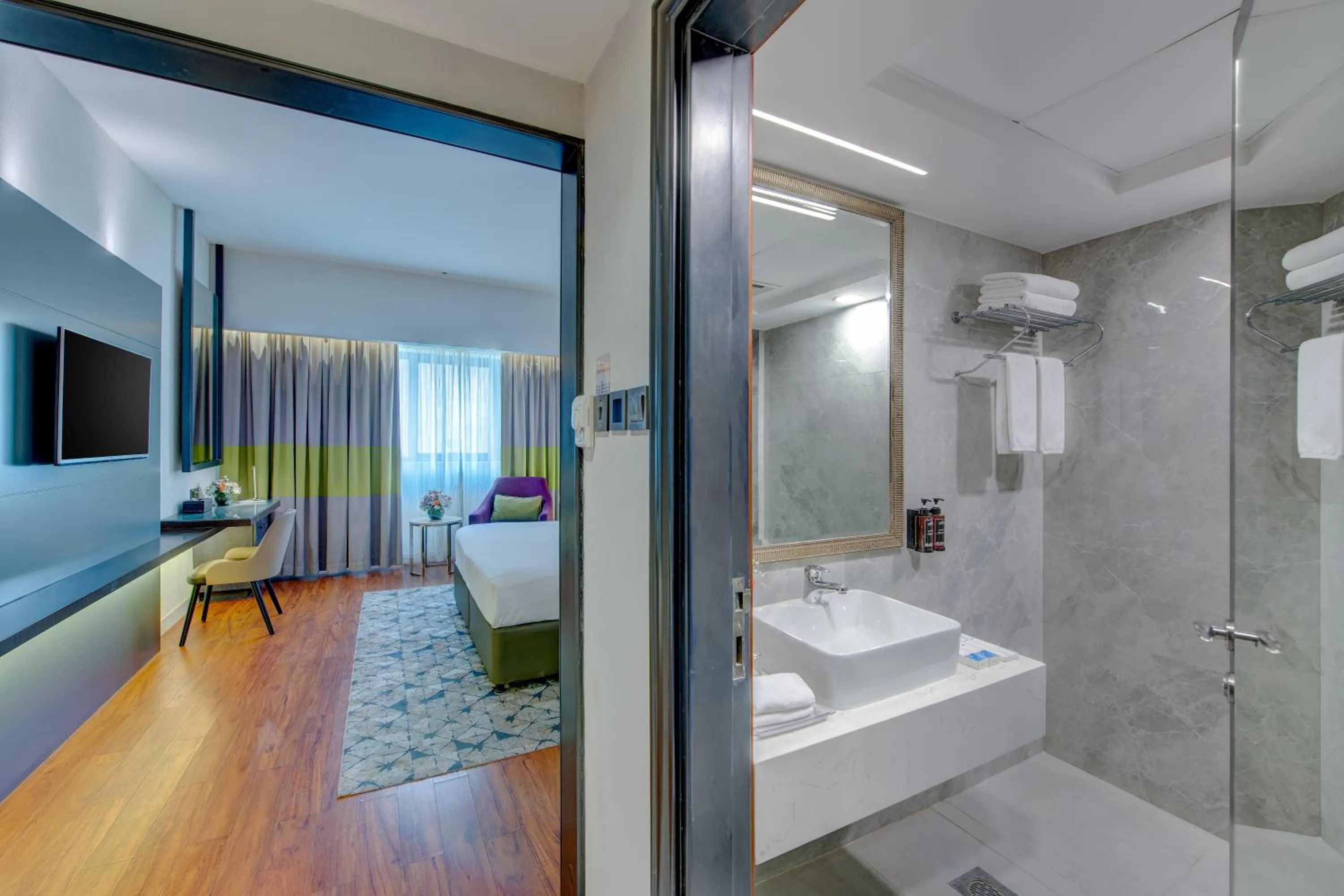 Bed in Howard Johnson Plaza by Wyndham Dubai Deira