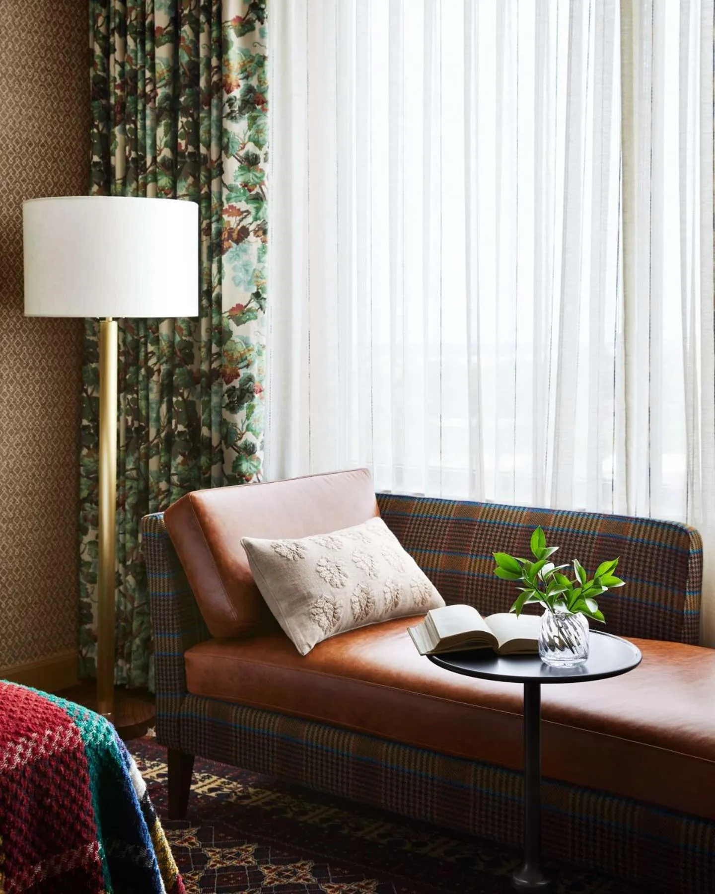 Living room in Graduate by Hilton East Lansing