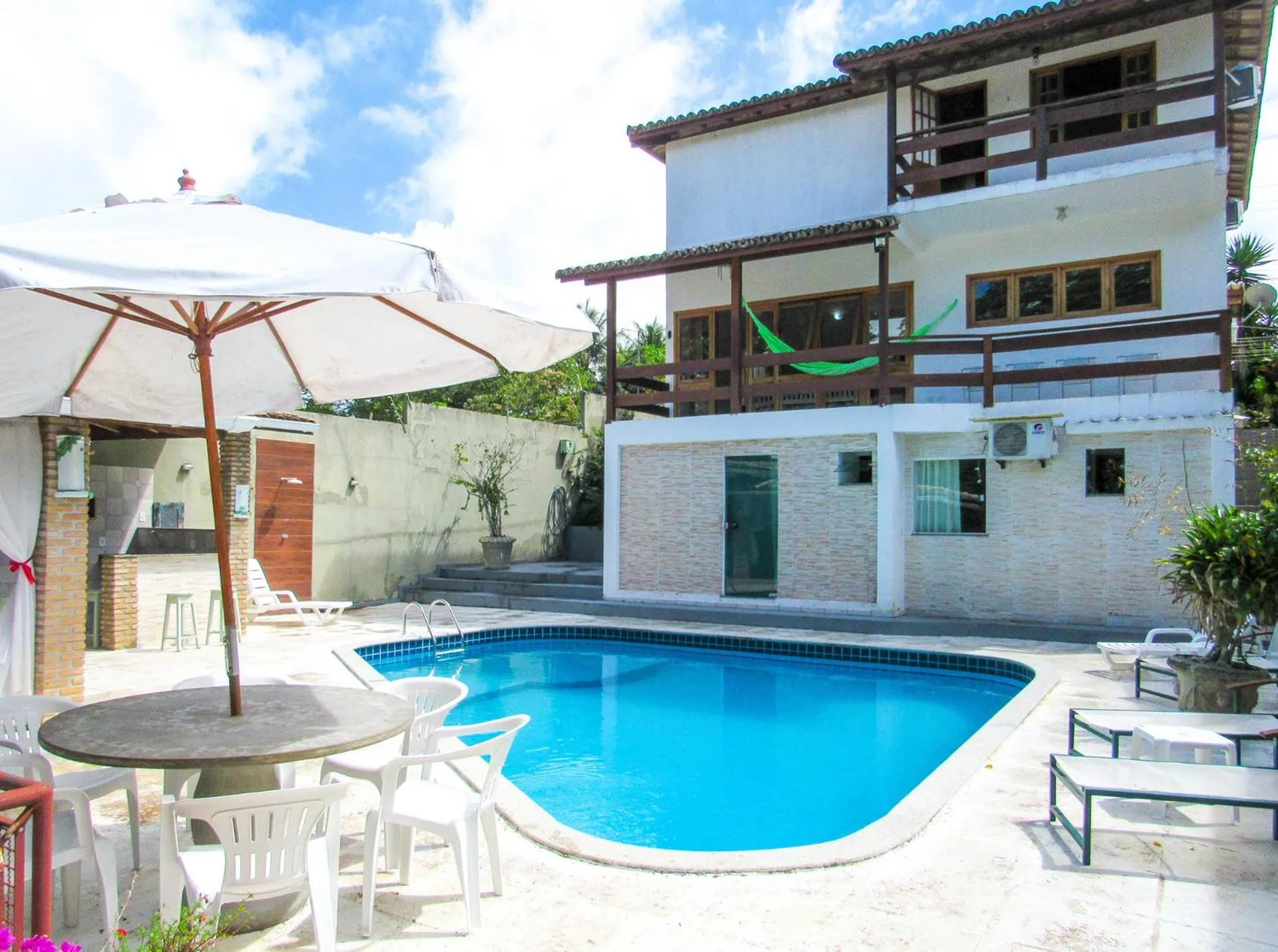 Swimming pool in Casa c wifi e lazer perto da praia em Porto Seguro