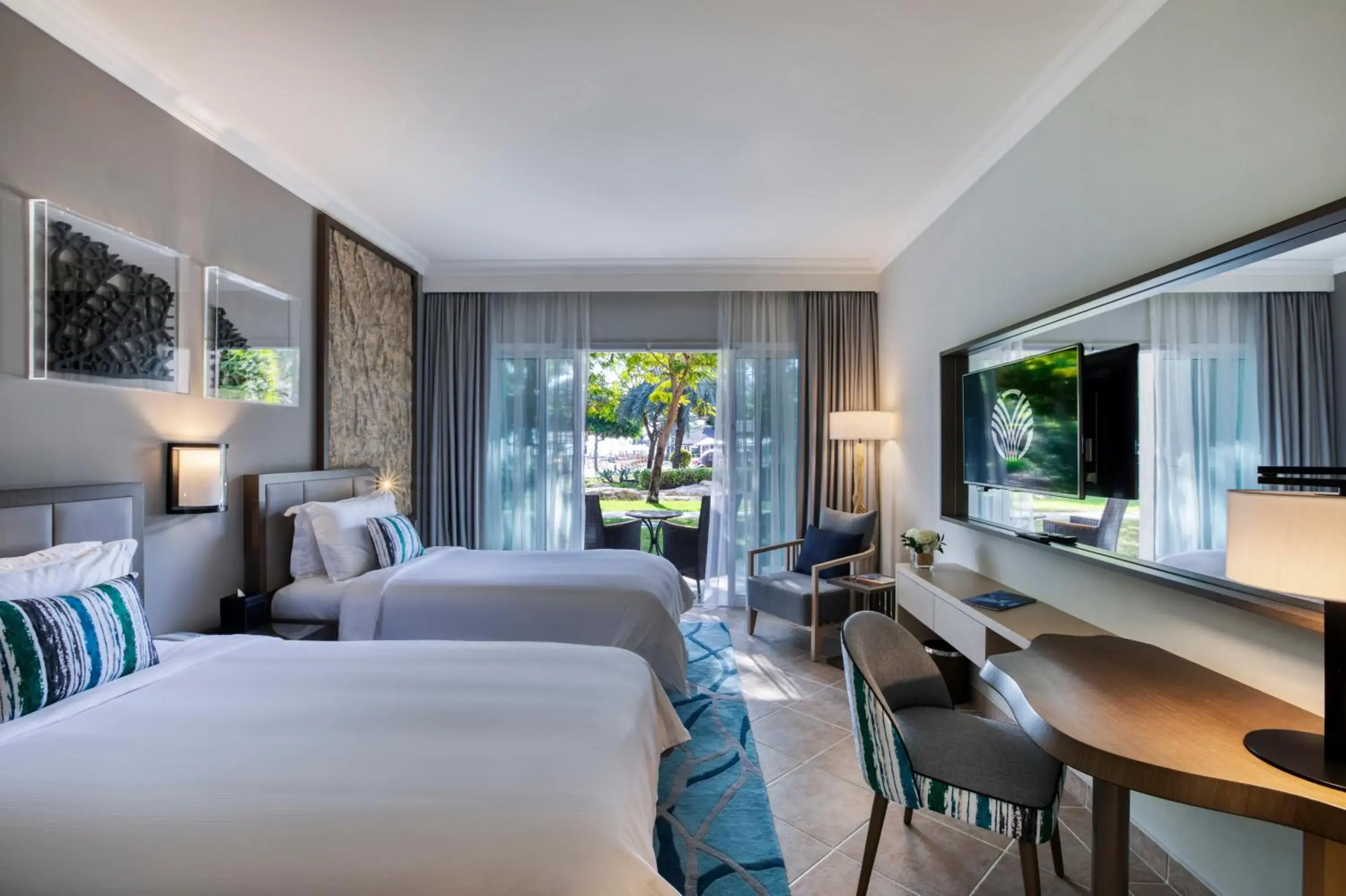 Garden View Room with Terrace - Twin Beds in Fujairah Rotana Resort & Spa - Al Aqah Beach Garden View Room with Terrace - Twin Beds in Fujairah Rotana Resort & Spa - Al Aqah Beach