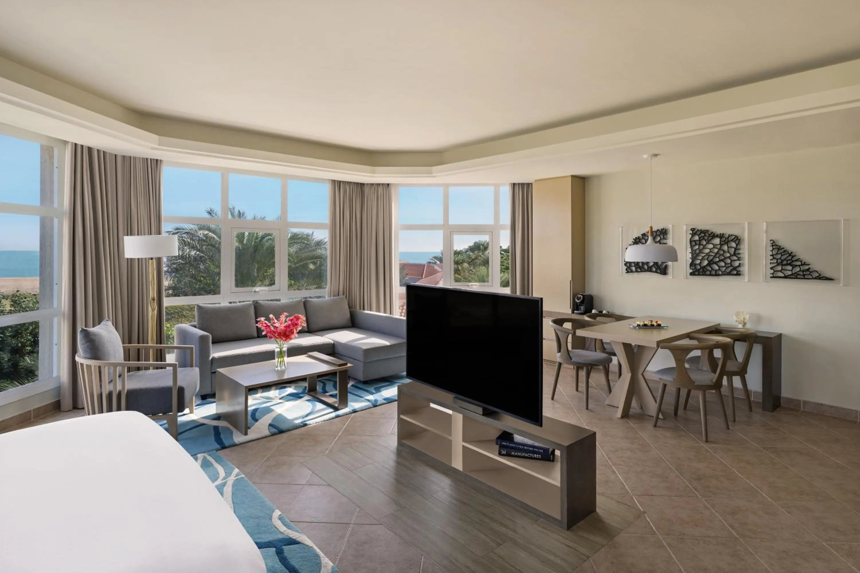 Living room, Bed in Fujairah Rotana Resort & Spa - Al Aqah Beach