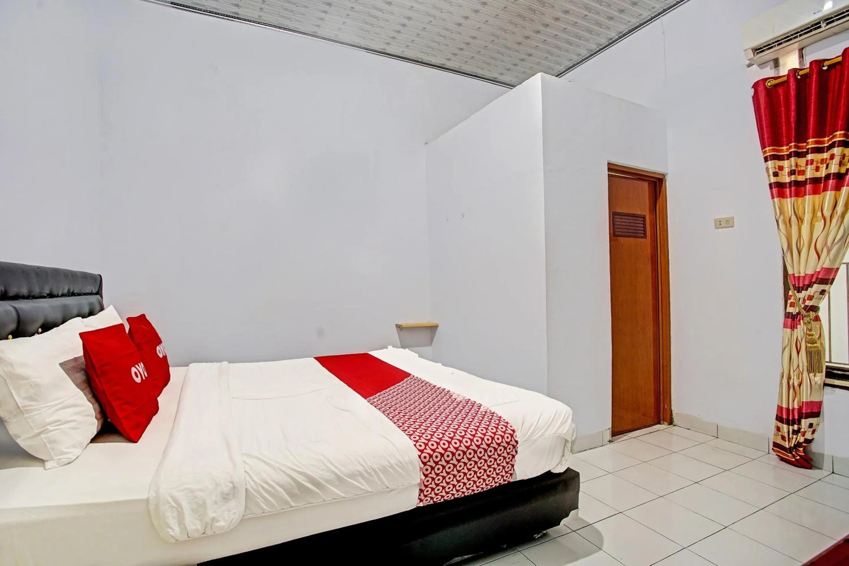 Bedroom in OYO 3994 Wisma Amalia