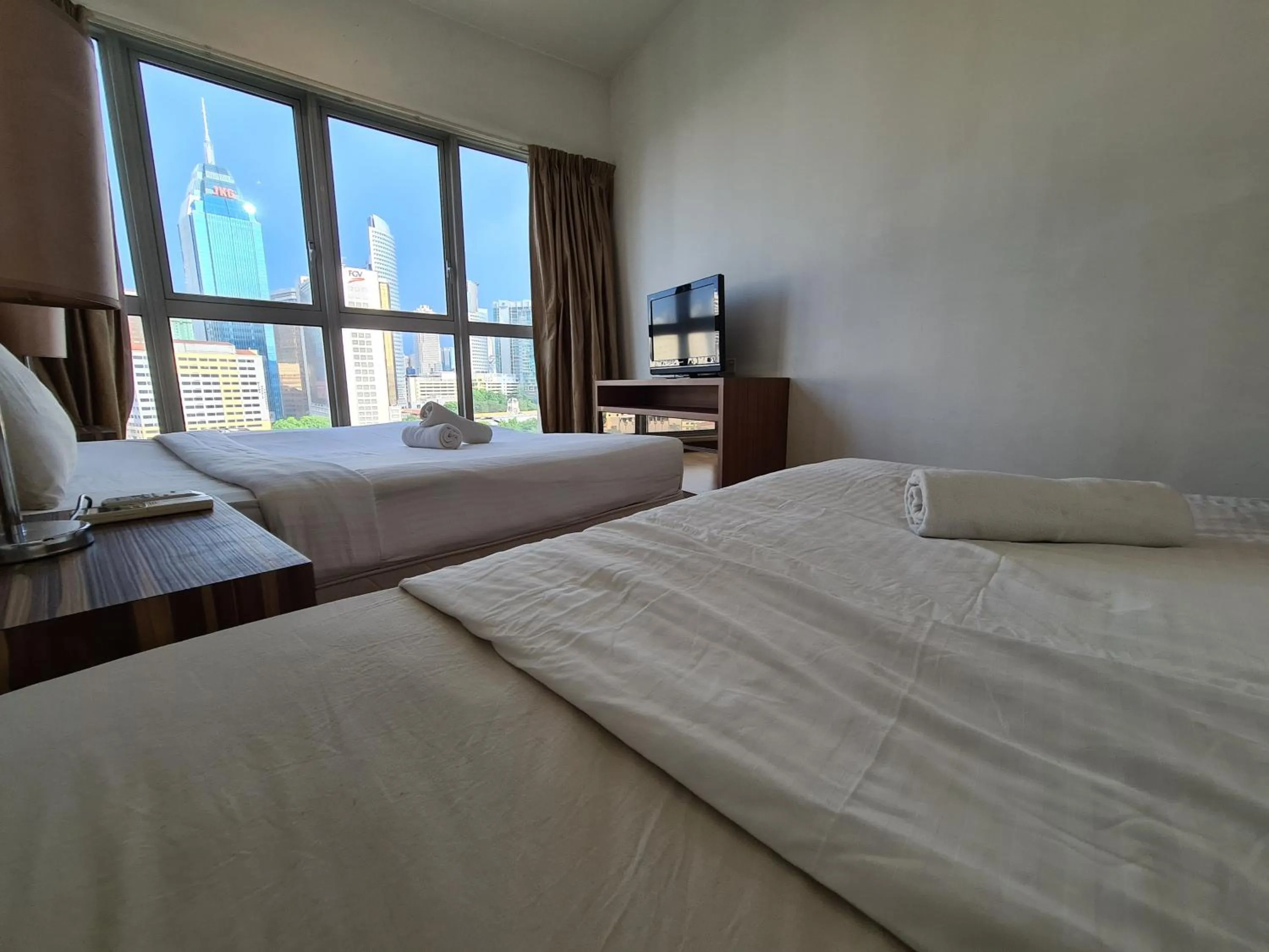 Bed in Regalia Residence KLCC View by iLuxHome