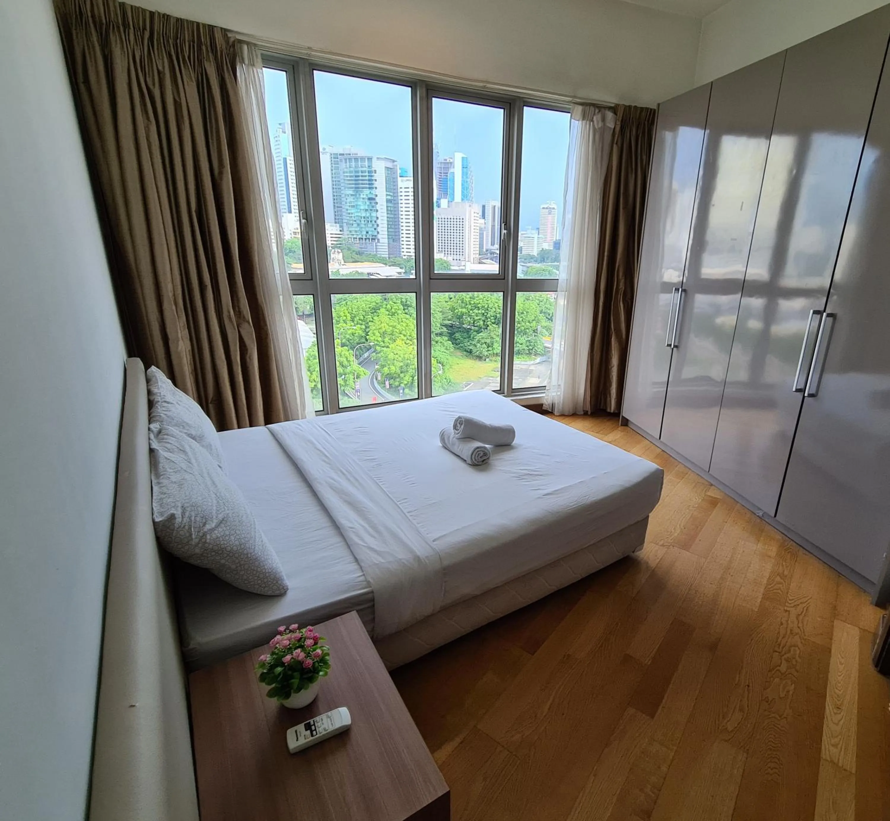 Bed in Regalia Residence KLCC View by iLuxHome