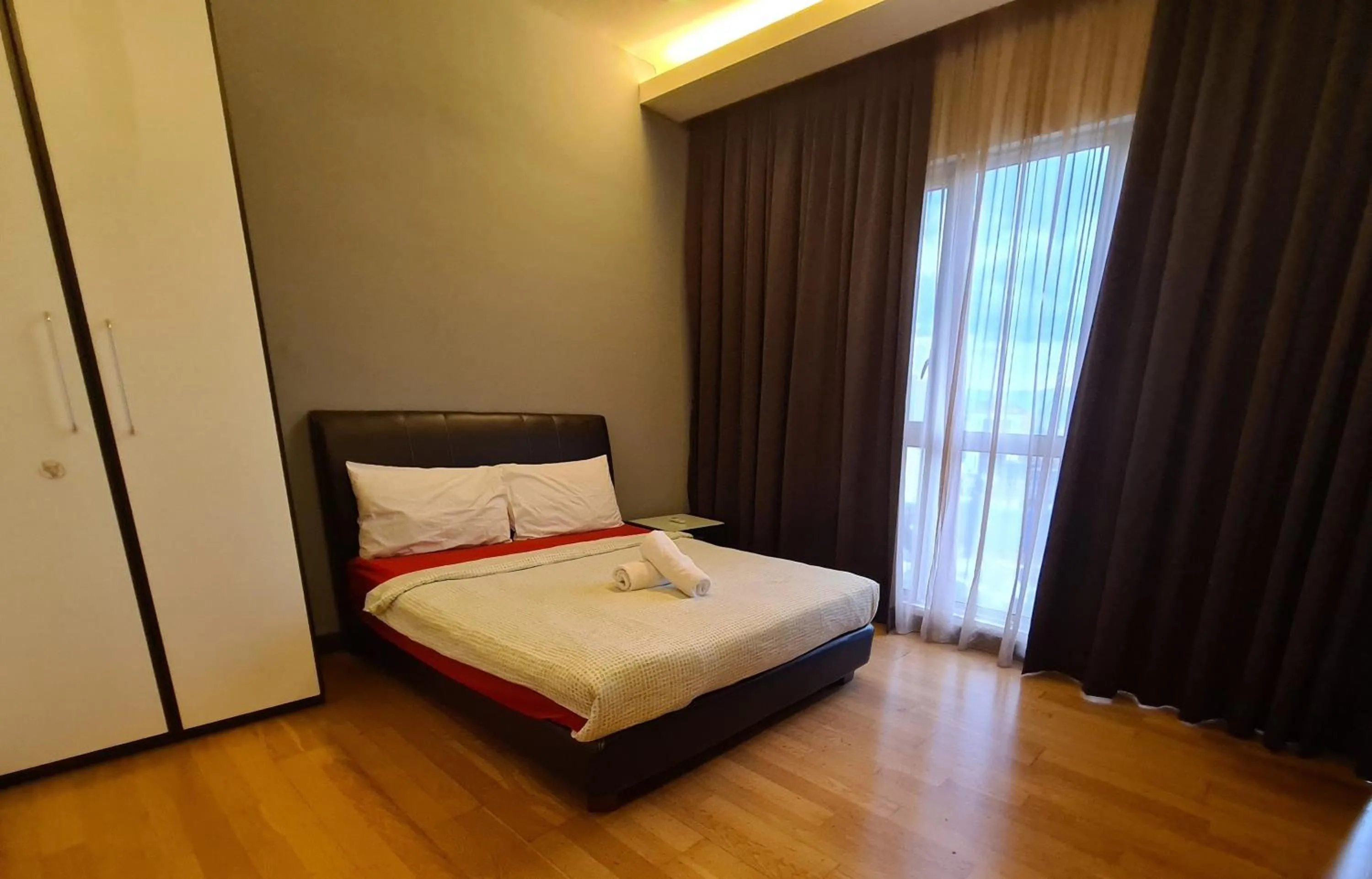 Bed in Regalia Residence KLCC View by iLuxHome