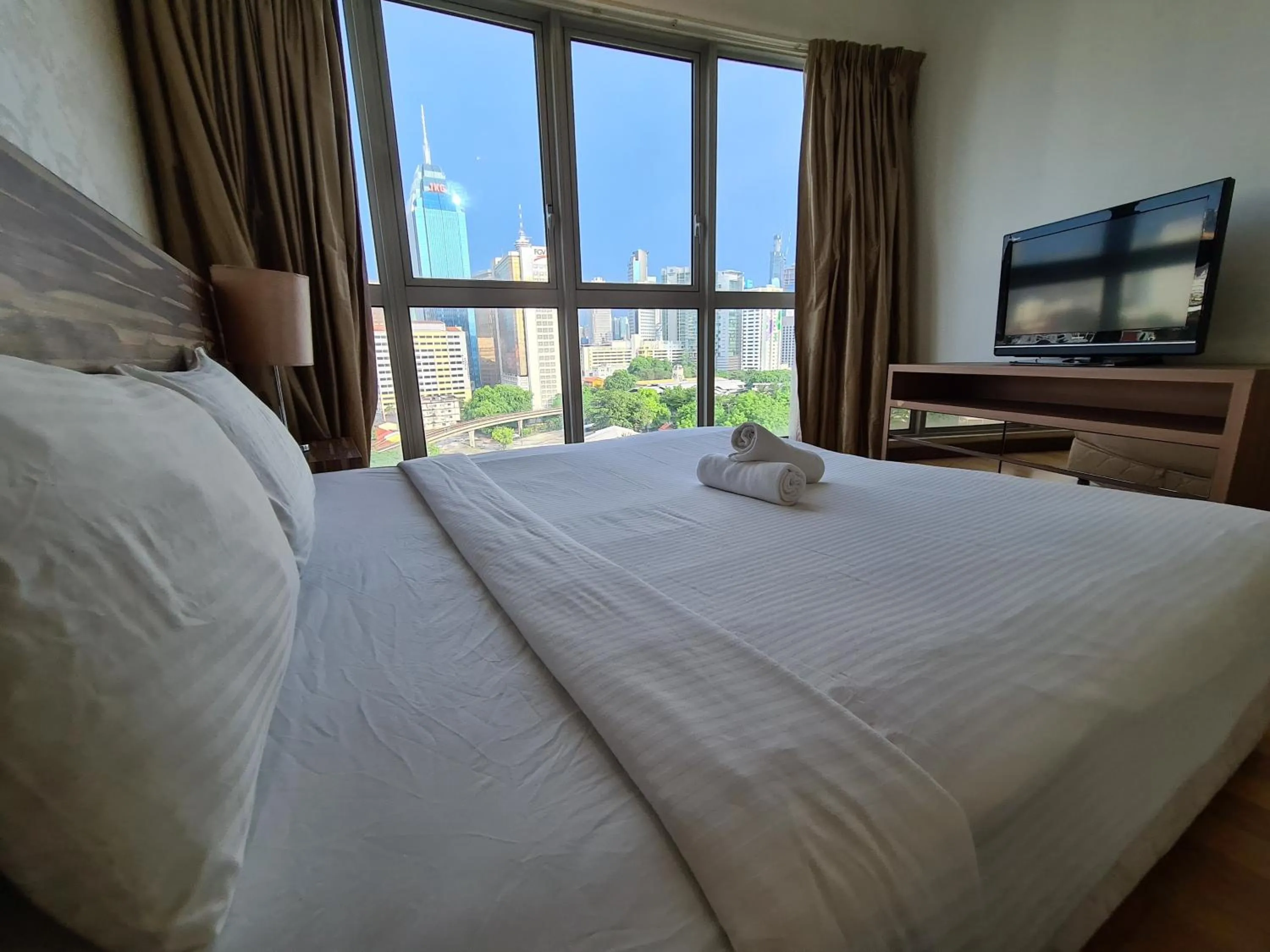 Bed in Regalia Residence KLCC View by iLuxHome