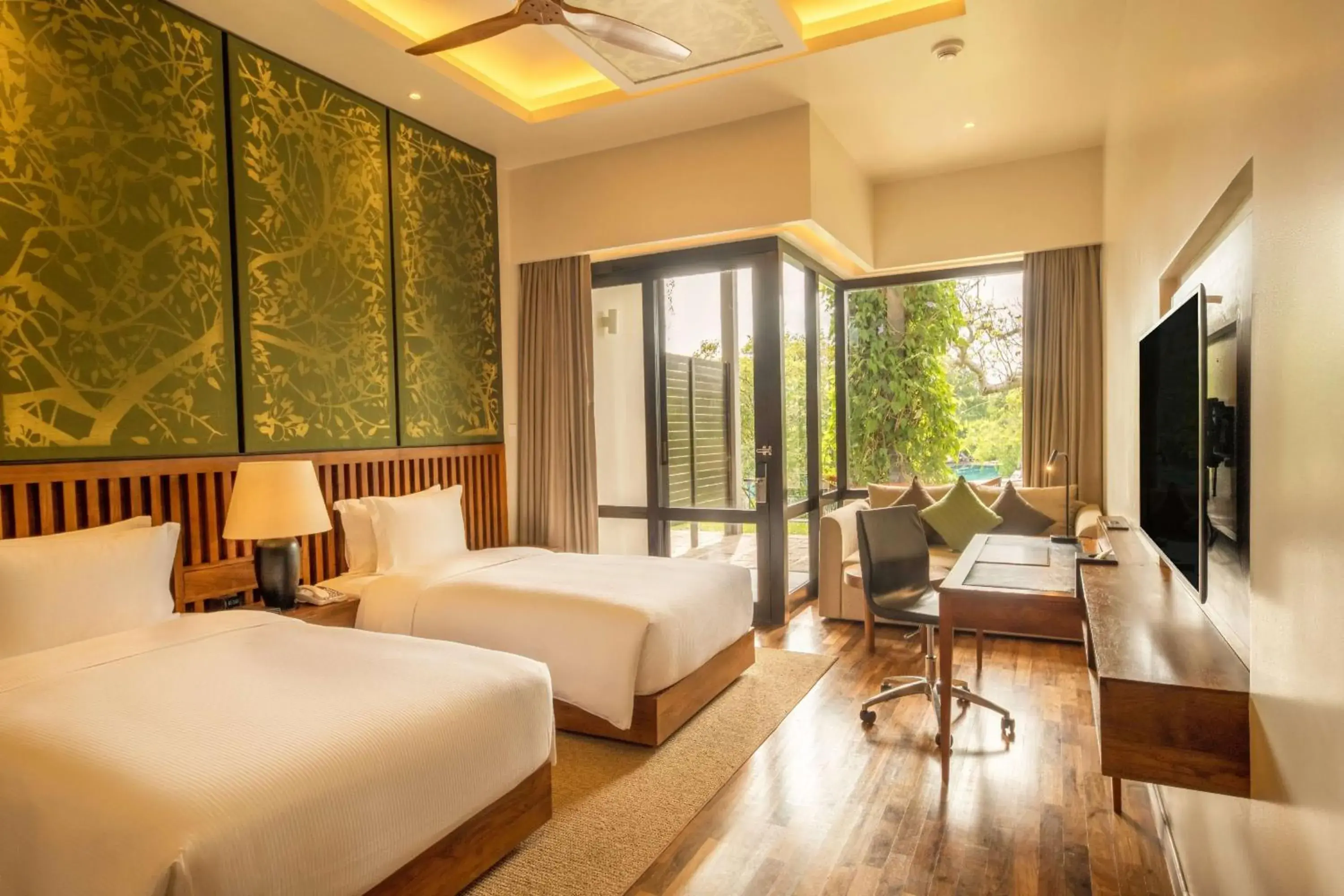 Living room, Bed in DoubleTree by Hilton Weerawila Rajawarna Resort Living room, Bed in DoubleTree by Hilton Weerawila Rajawarna Resort