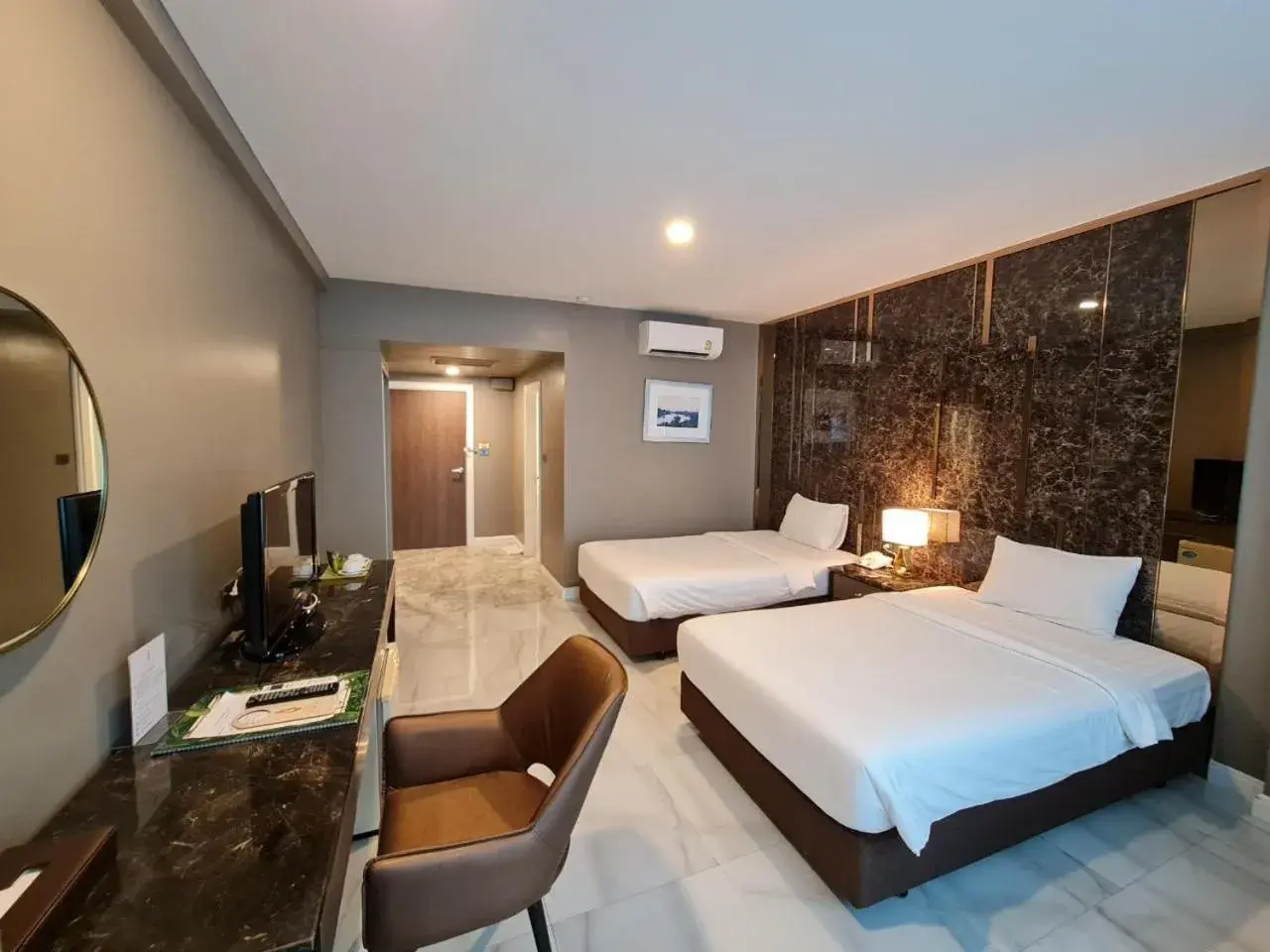 Bed in Chaisaeng Palace Hotel Bed in Chaisaeng Palace Hotel