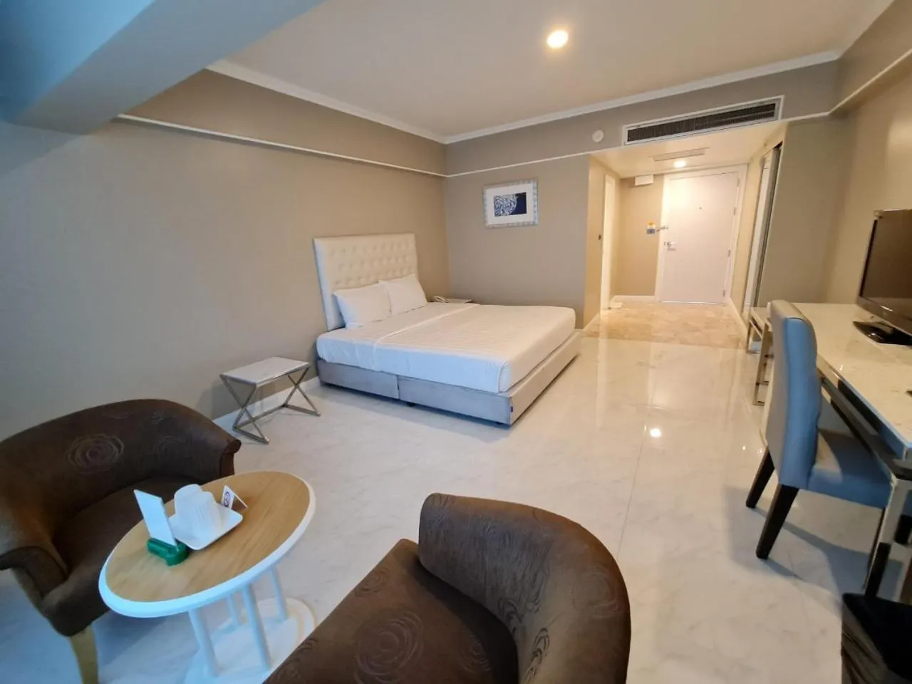 Bed in Chaisaeng Palace Hotel