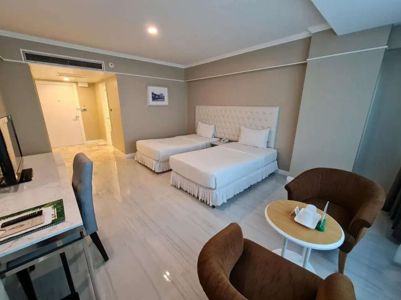 Bed in Chaisaeng Palace Hotel Bed in Chaisaeng Palace Hotel