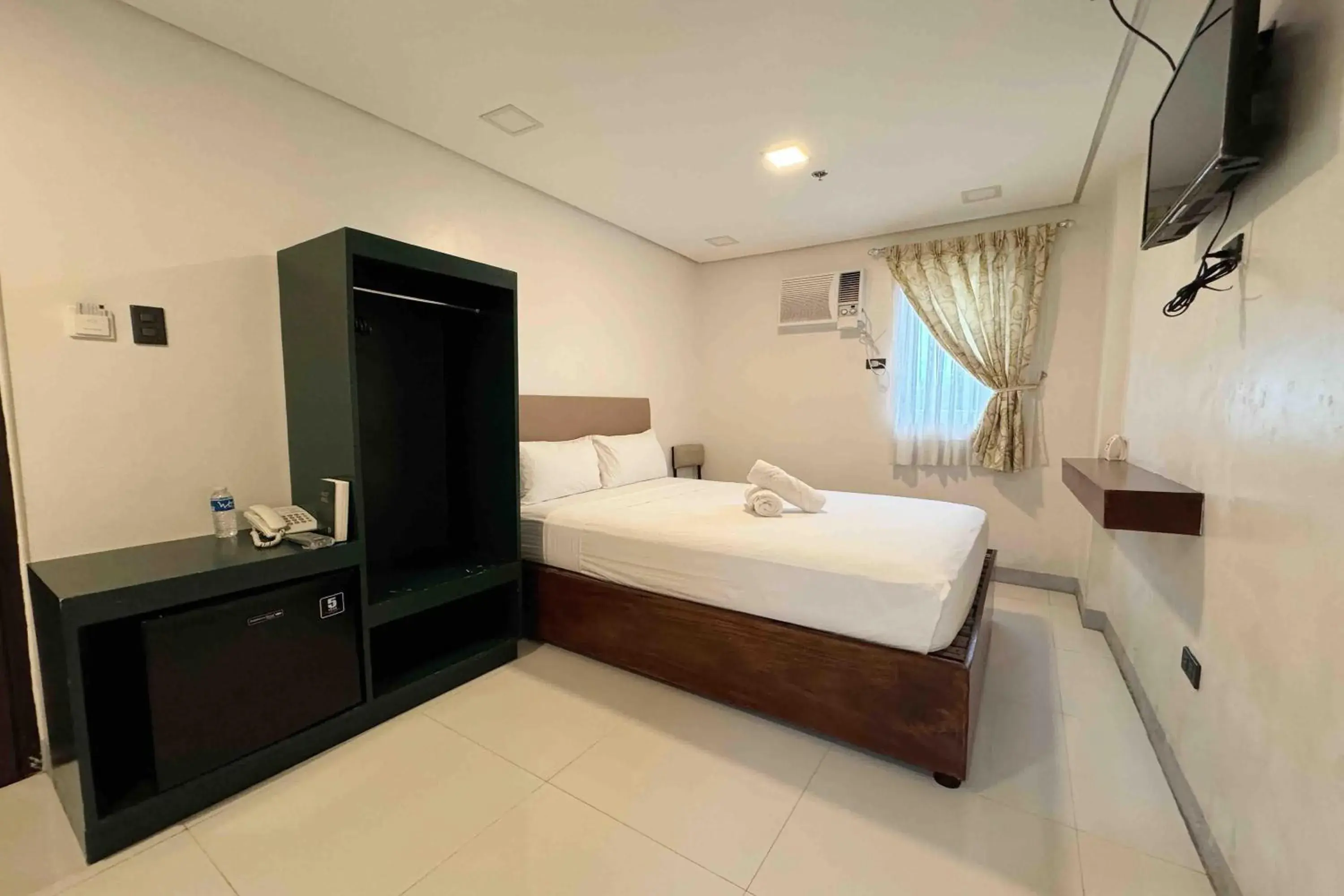 Photo of the whole room, Bed in Belltower CSheLi Suites Bantay - Vigan Photo of the whole room, Bed in Belltower CSheLi Suites Bantay - Vigan