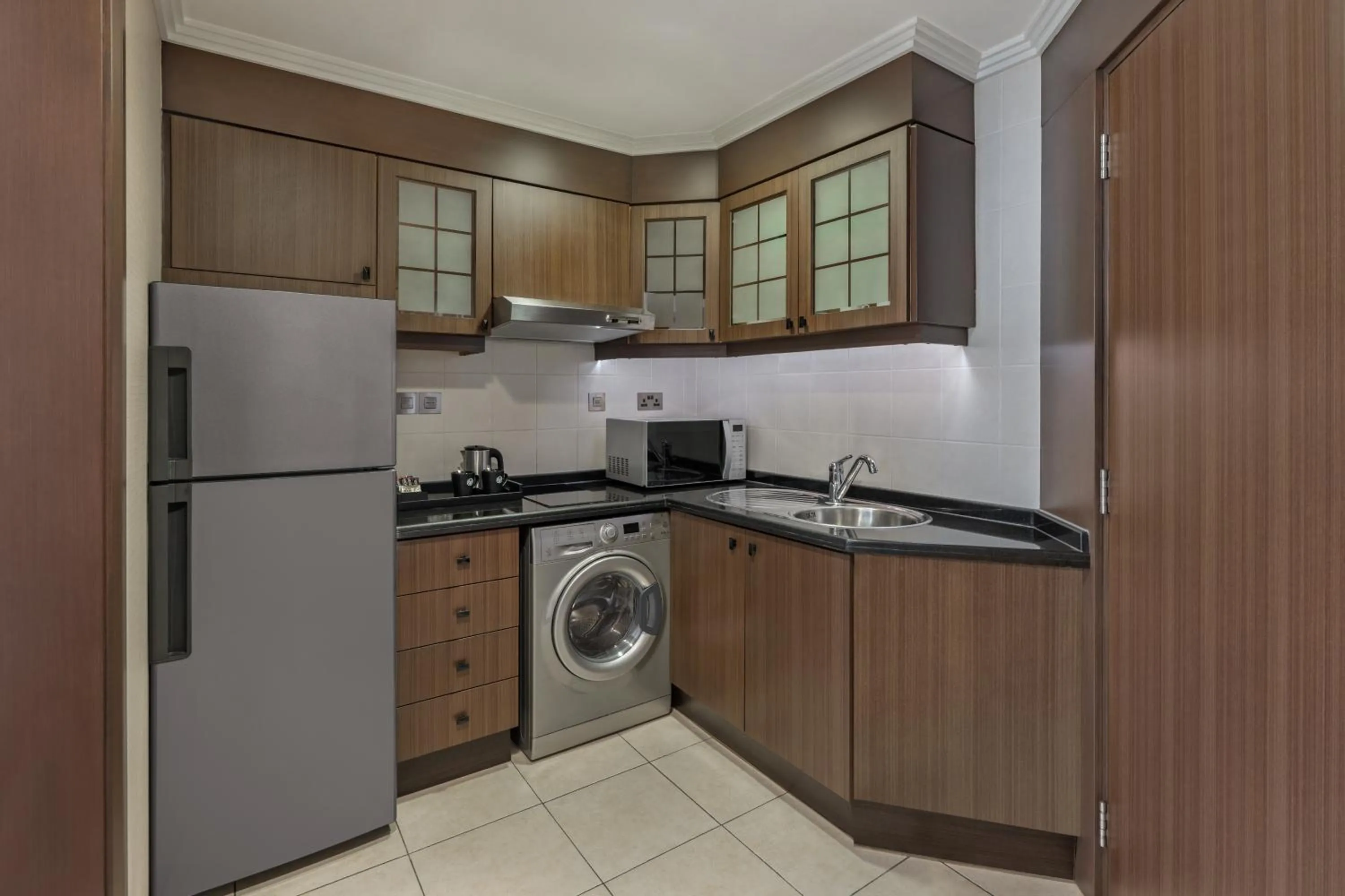 Kitchen or kitchenette in Al Maha Arjaan by Rotana