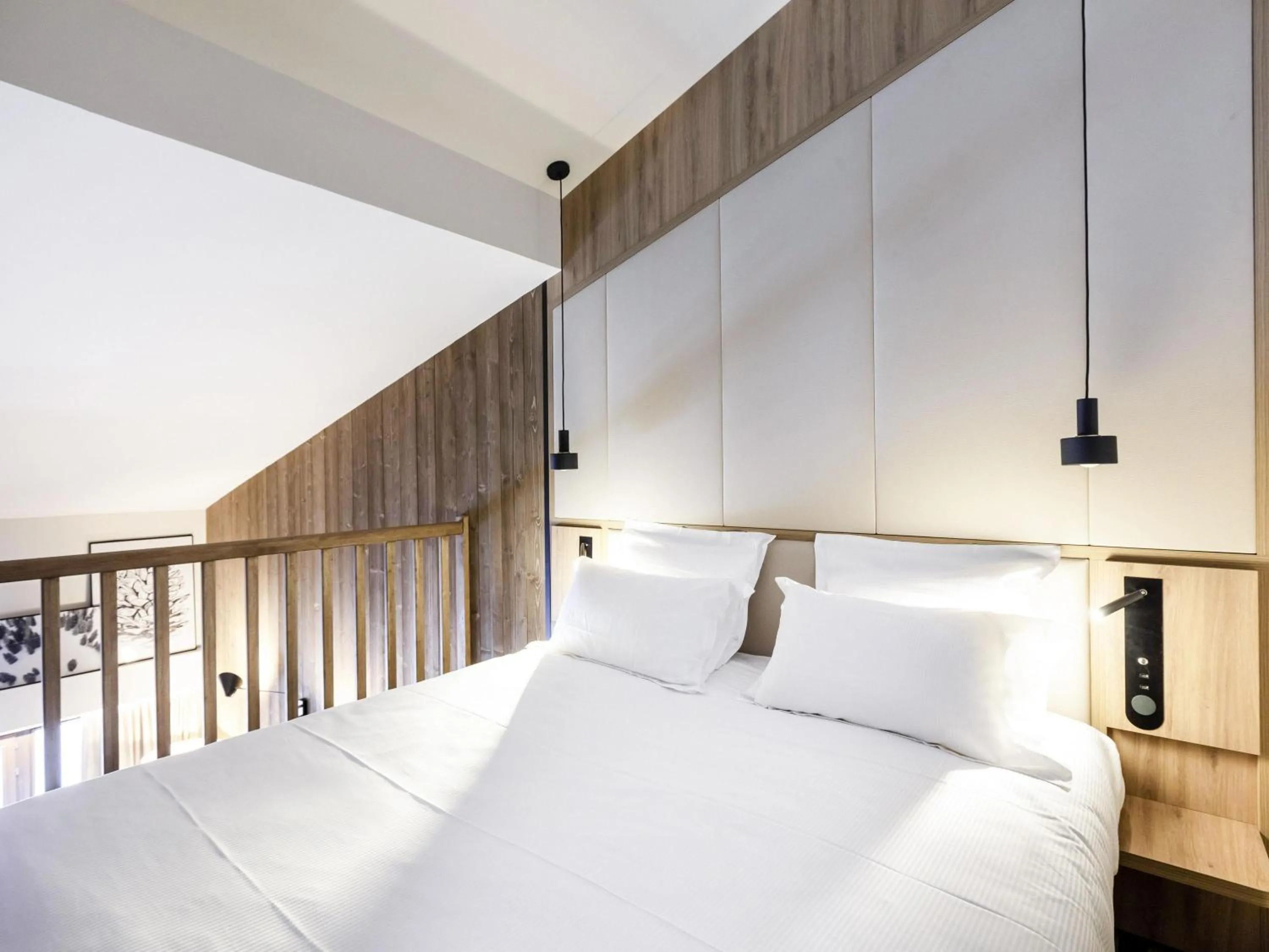 Photo of the whole room, Bed in Novotel Megève Mont-Blanc