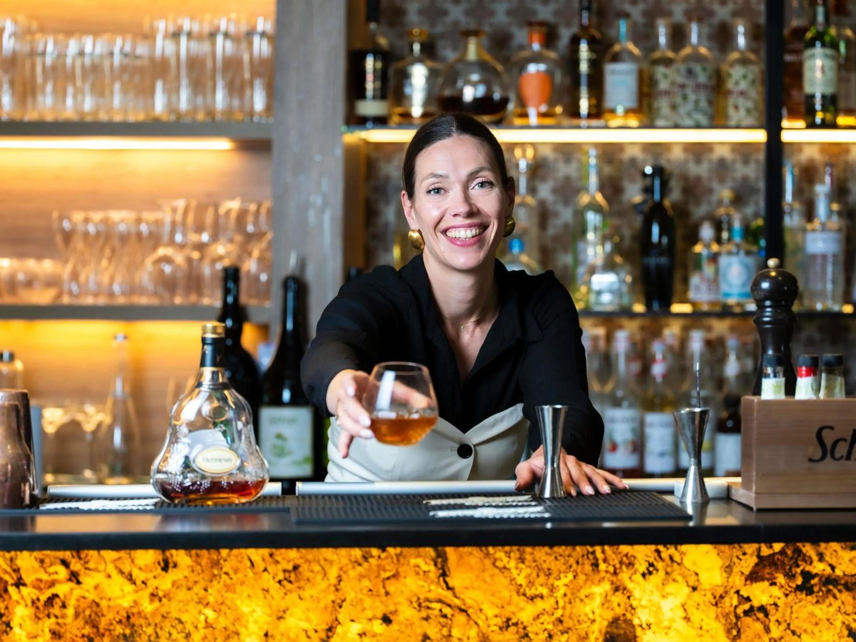 Lounge or bar in Novotel Megève Mont-Blanc